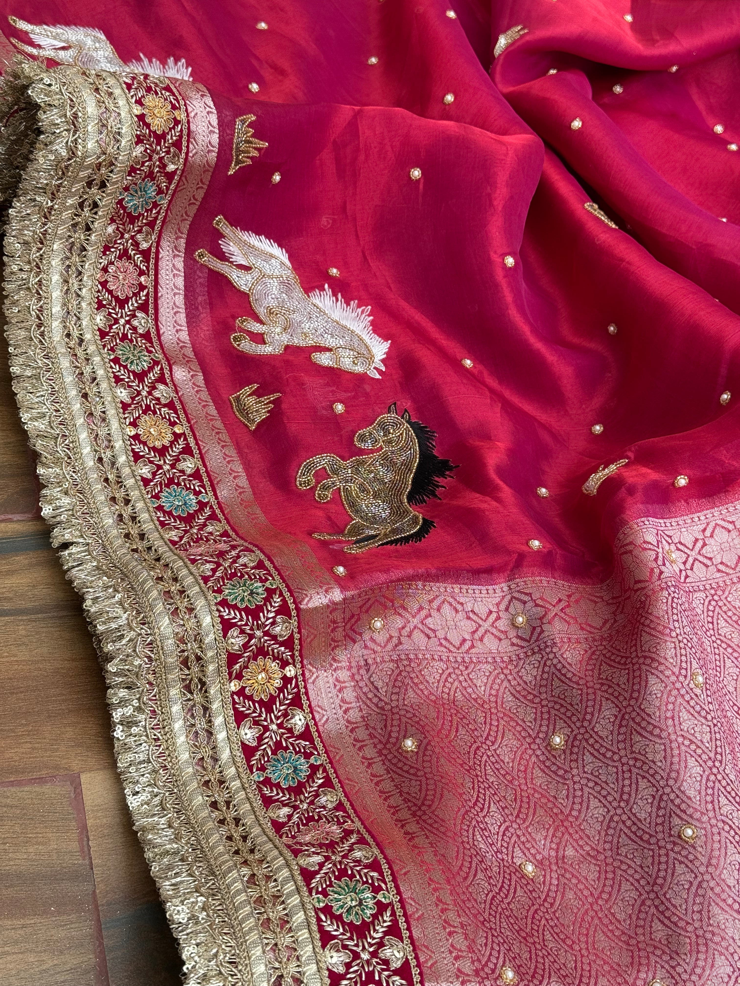 Horse hand embroidered motif cherry pinkish red dhup chao effect tissue silk banarasi gotapatti kadhwa saree