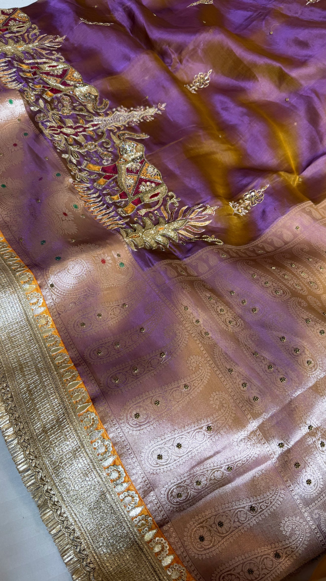 Elephant motif lavender tissue silk hand embroidered kadhwa saree