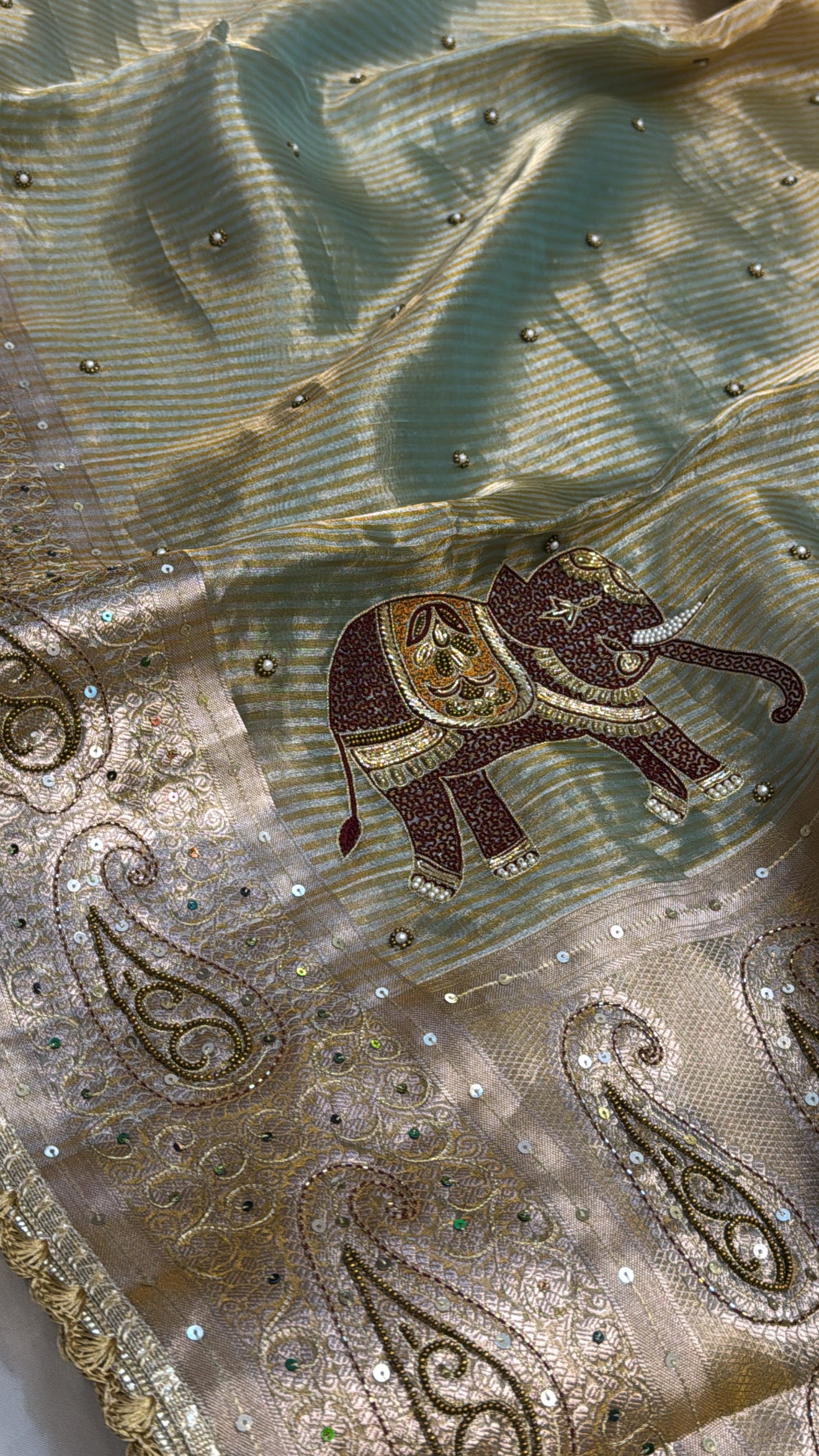 Molten gold-sage green tissue silk ombre shaded hand embroidered saree