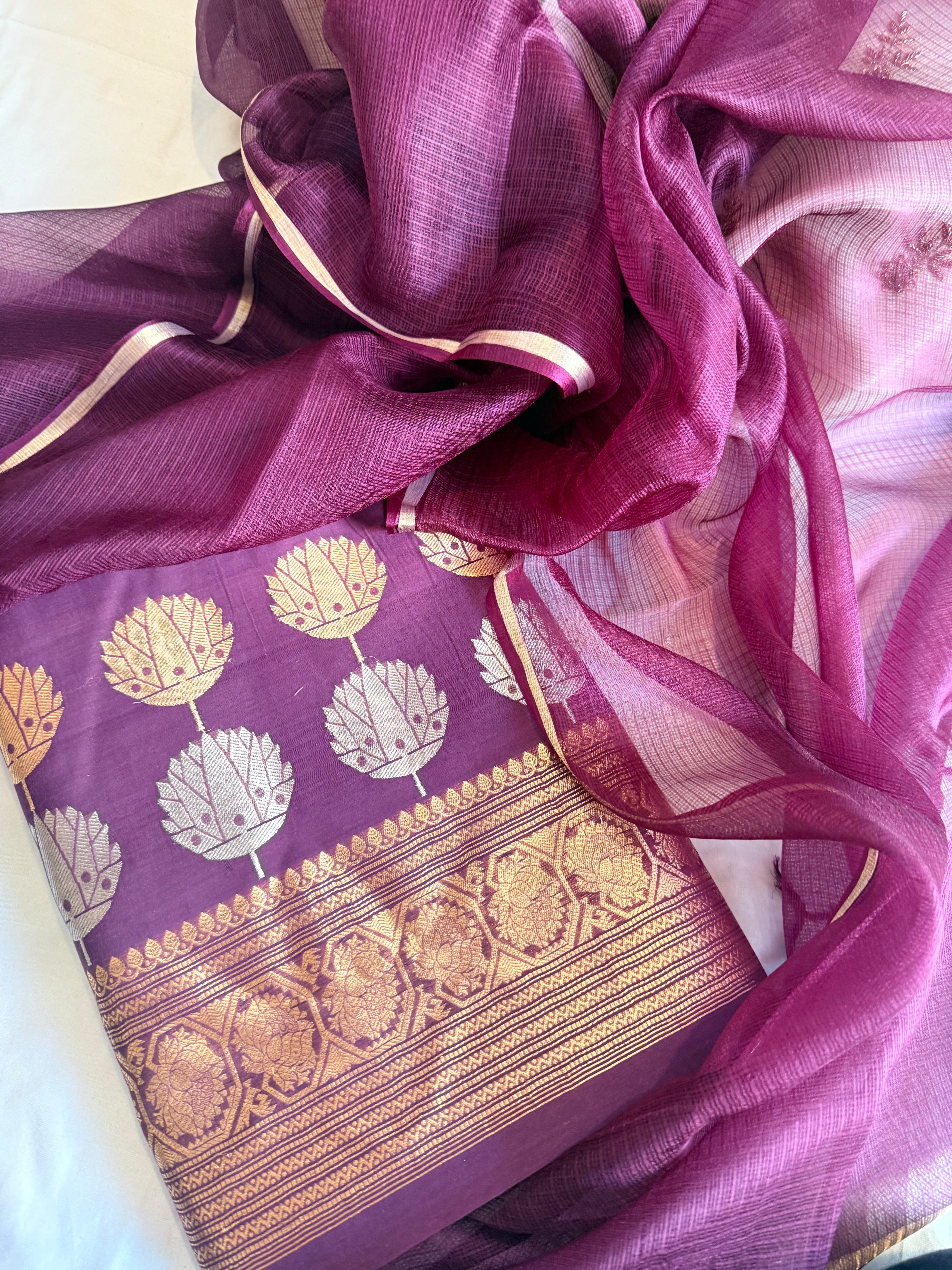Plum purple mul cotton kadhwa buti kurta paired with kora silk net duppata set