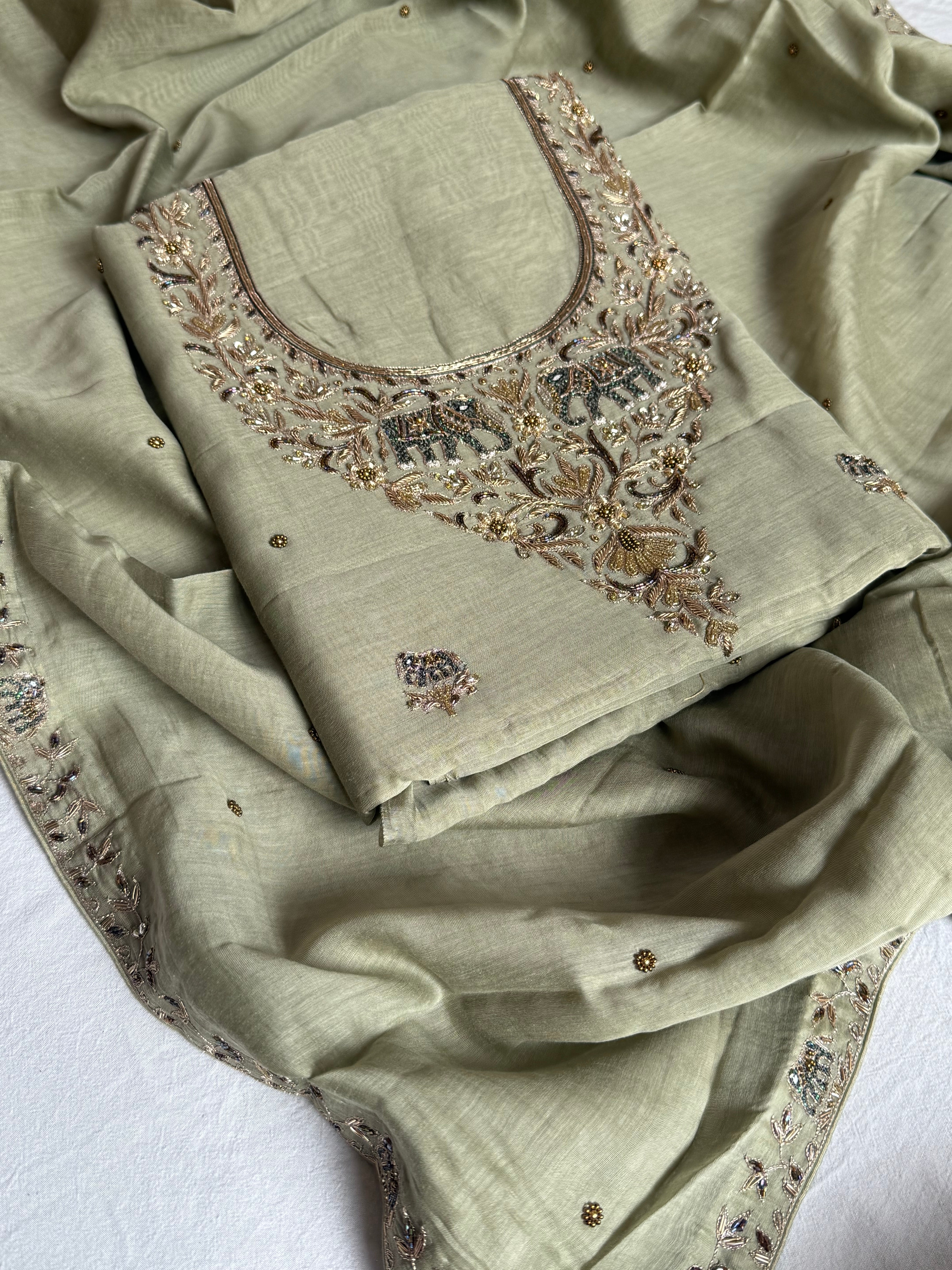 Banarasi formal wear mul cotton sage green hand embroidered kadhwa suit set with mul cotton hand embroidered duppata