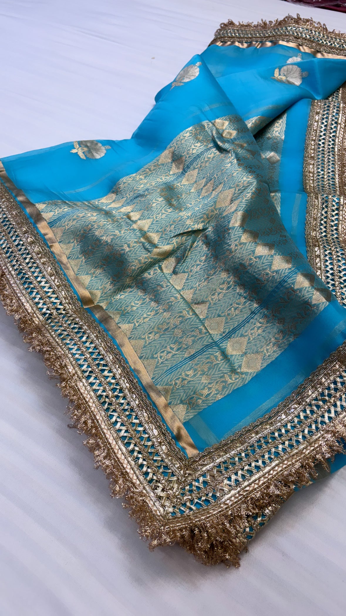Neela samundar shade leela kora silk kadhwa buti saree