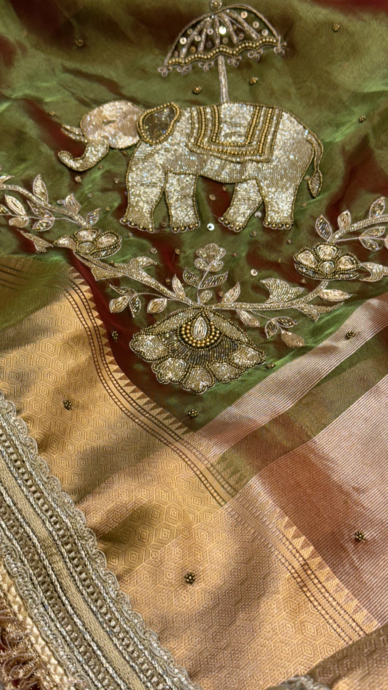 Dulhan ki maa wali sarees - Mehendi green elephant motif hand embroidered tissue saree