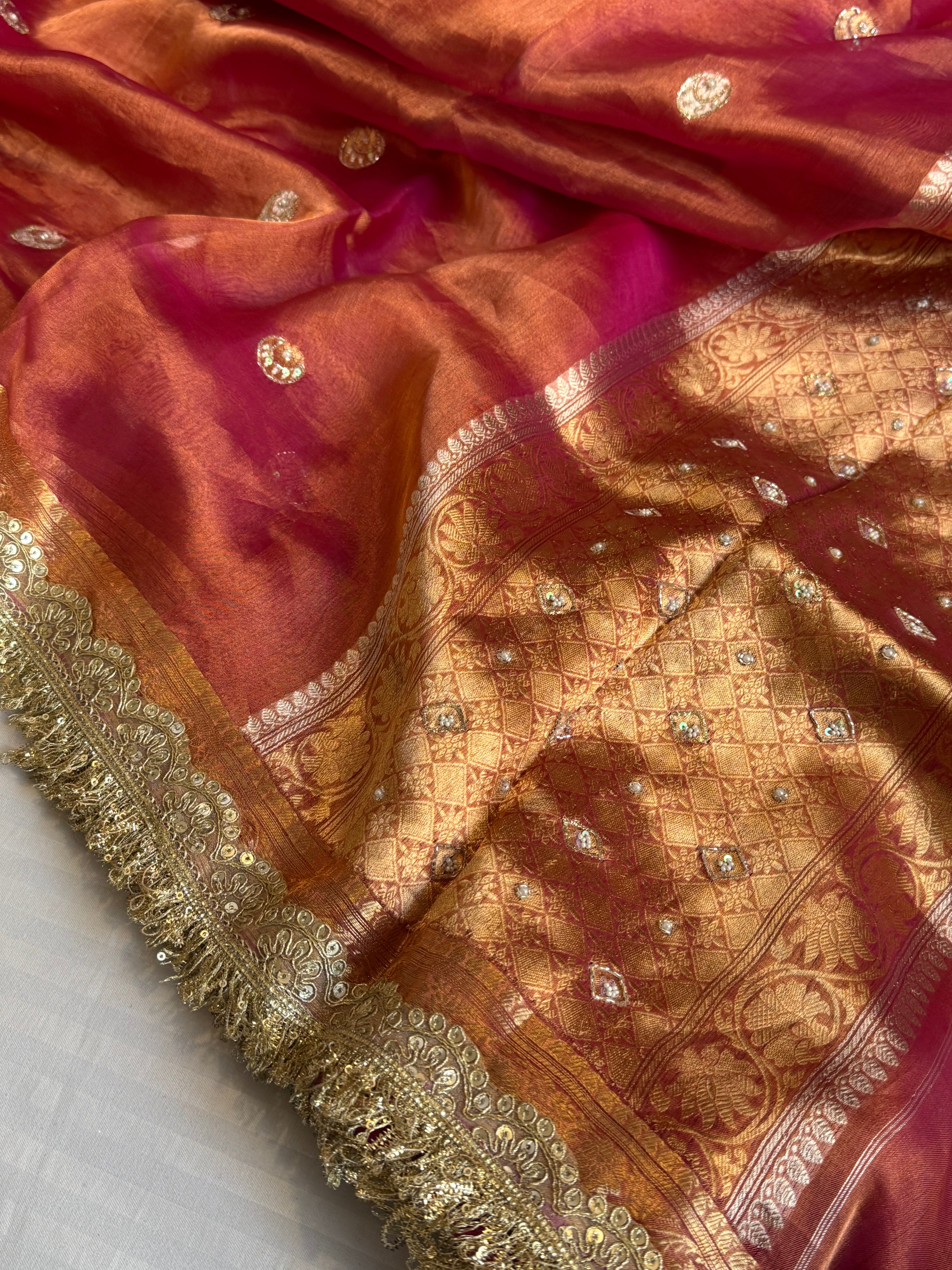 Chand tara rani pink dhup chao effect tissue silk hand embroidered saree