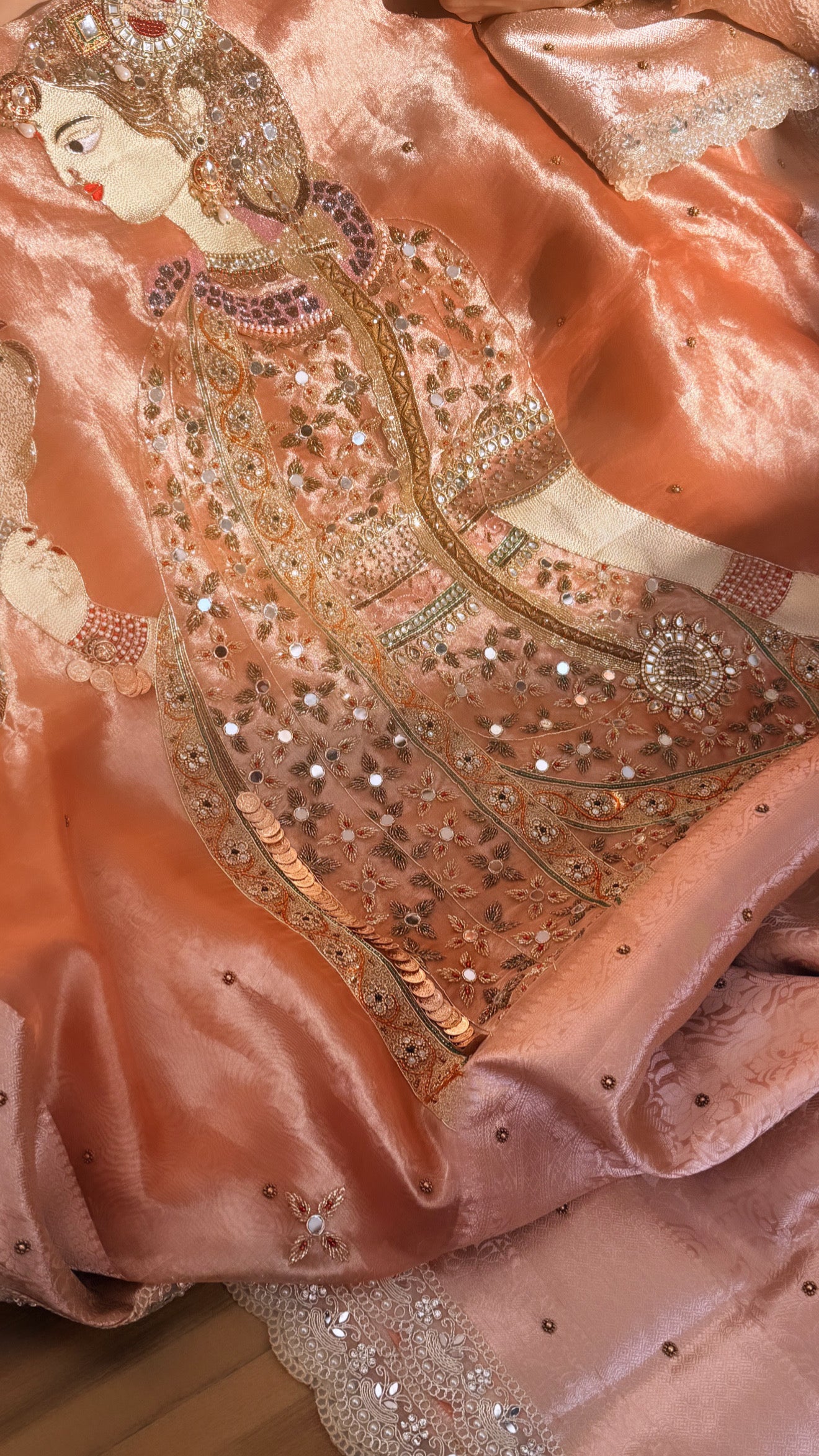 Heer saree with jadau necklace work hand embroidered tissue silk gajri peach saree