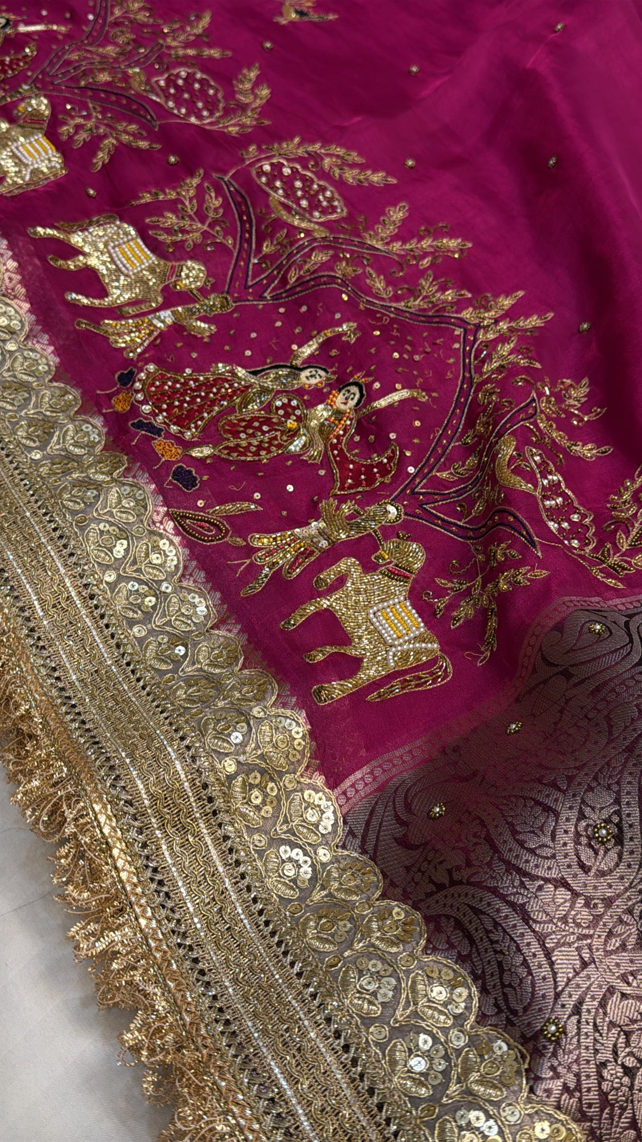 Hot pink rasleela tissue silk hand embroidered kadhwa saree