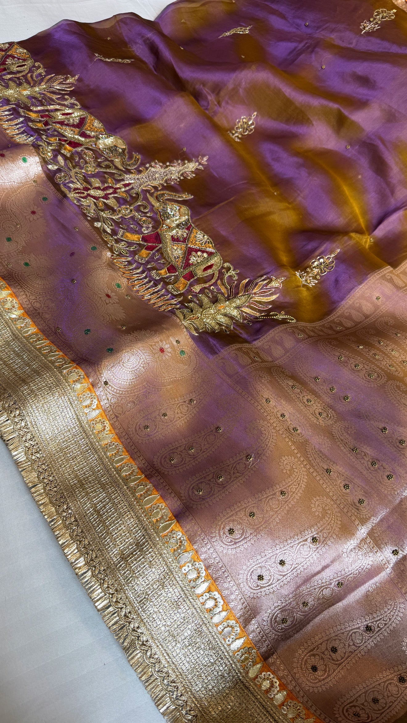 Elephant motif lavender tissue silk hand embroidered kadhwa saree