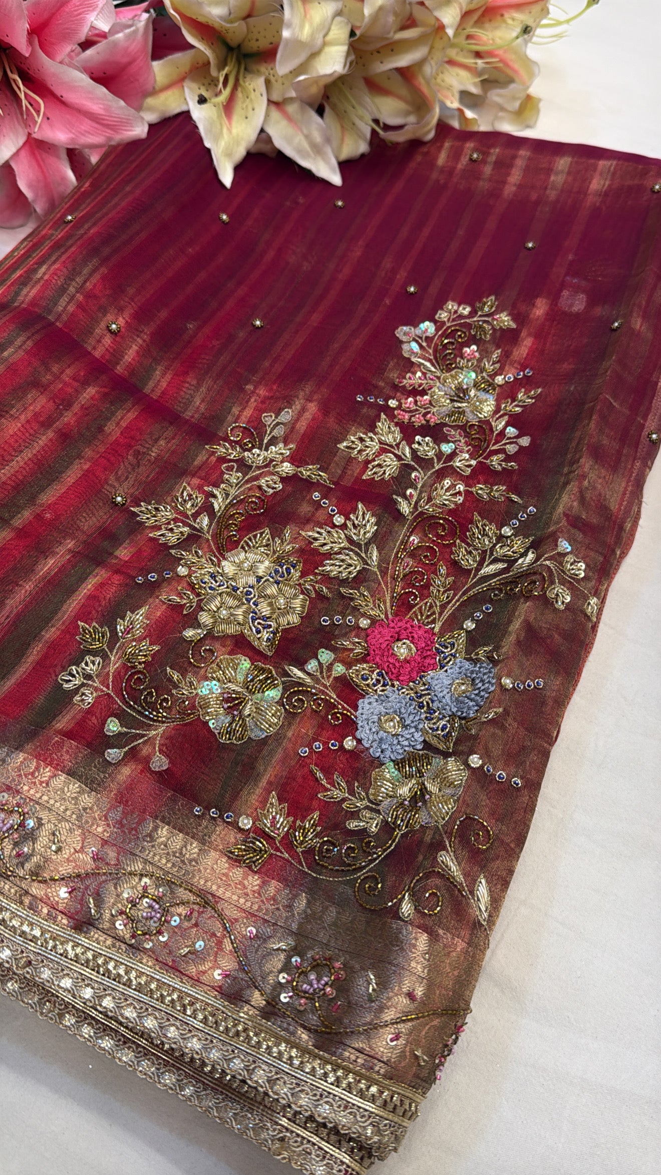 Husn tissue silk multicoloured striped kadhwa hand embroidered saree