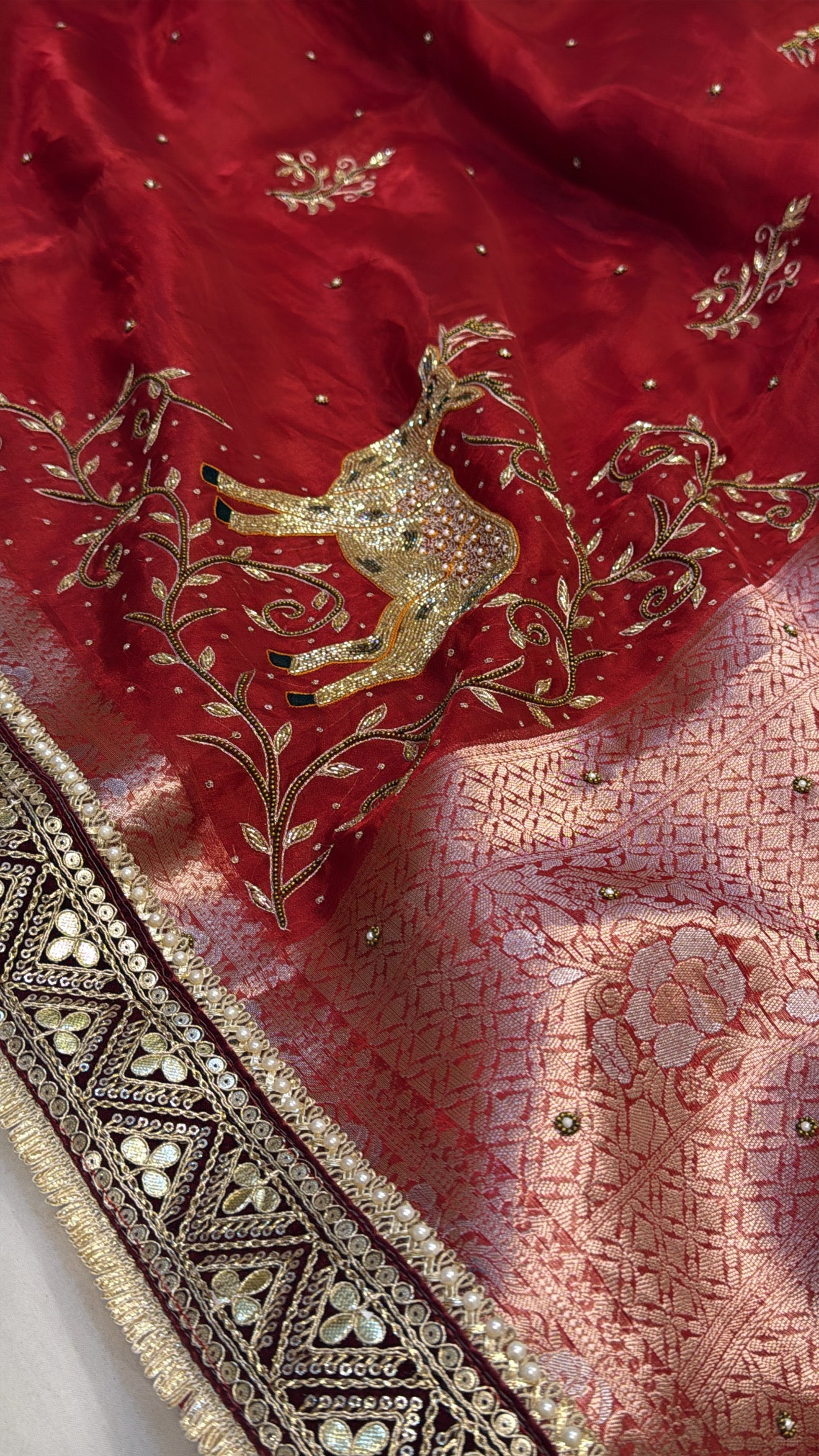 Blood red deer motif husn tissue silk hand embroidered kadhwa saree