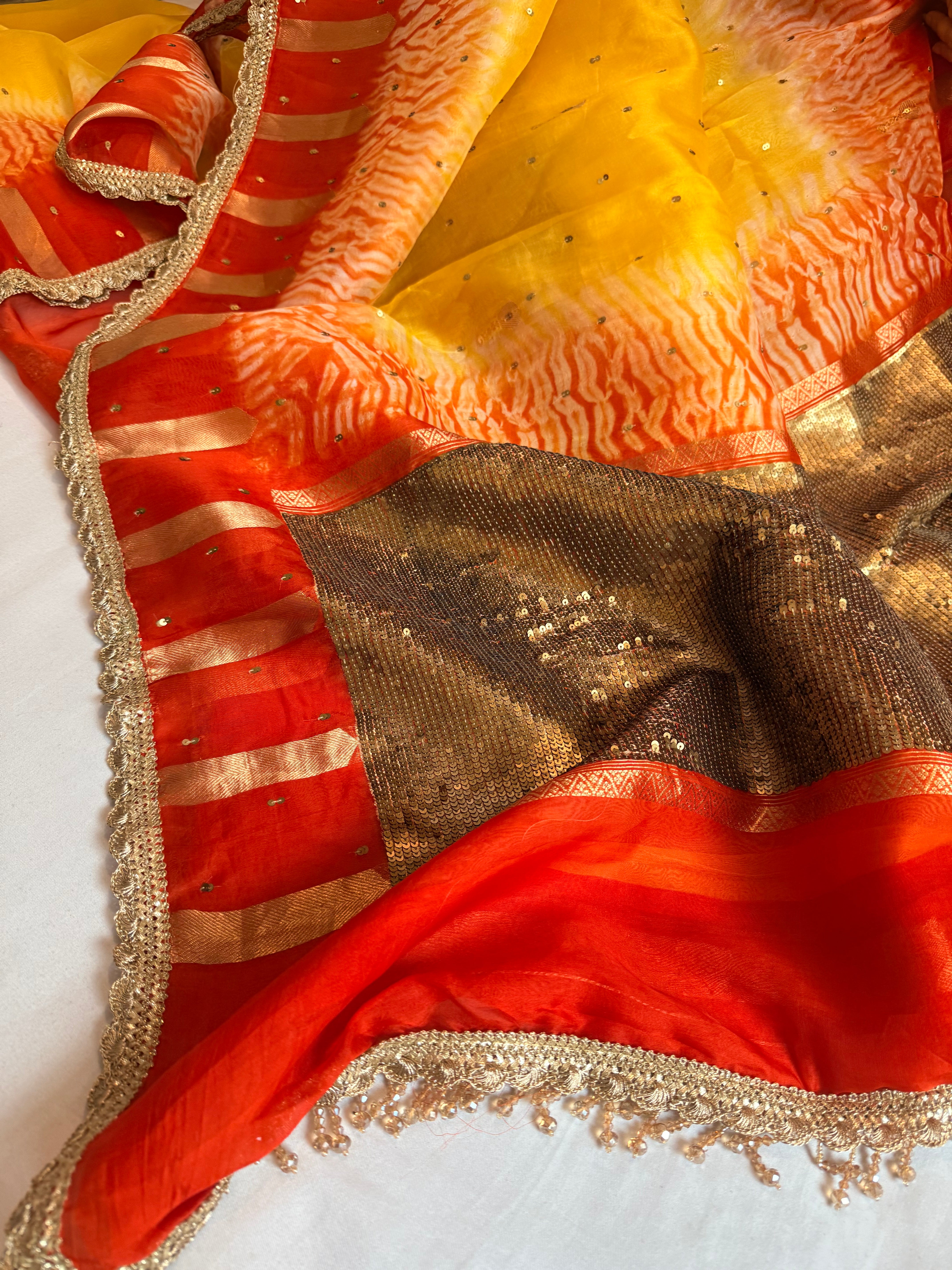 Shibori dye kora silk salma sitara work hand embroidered sequins saree