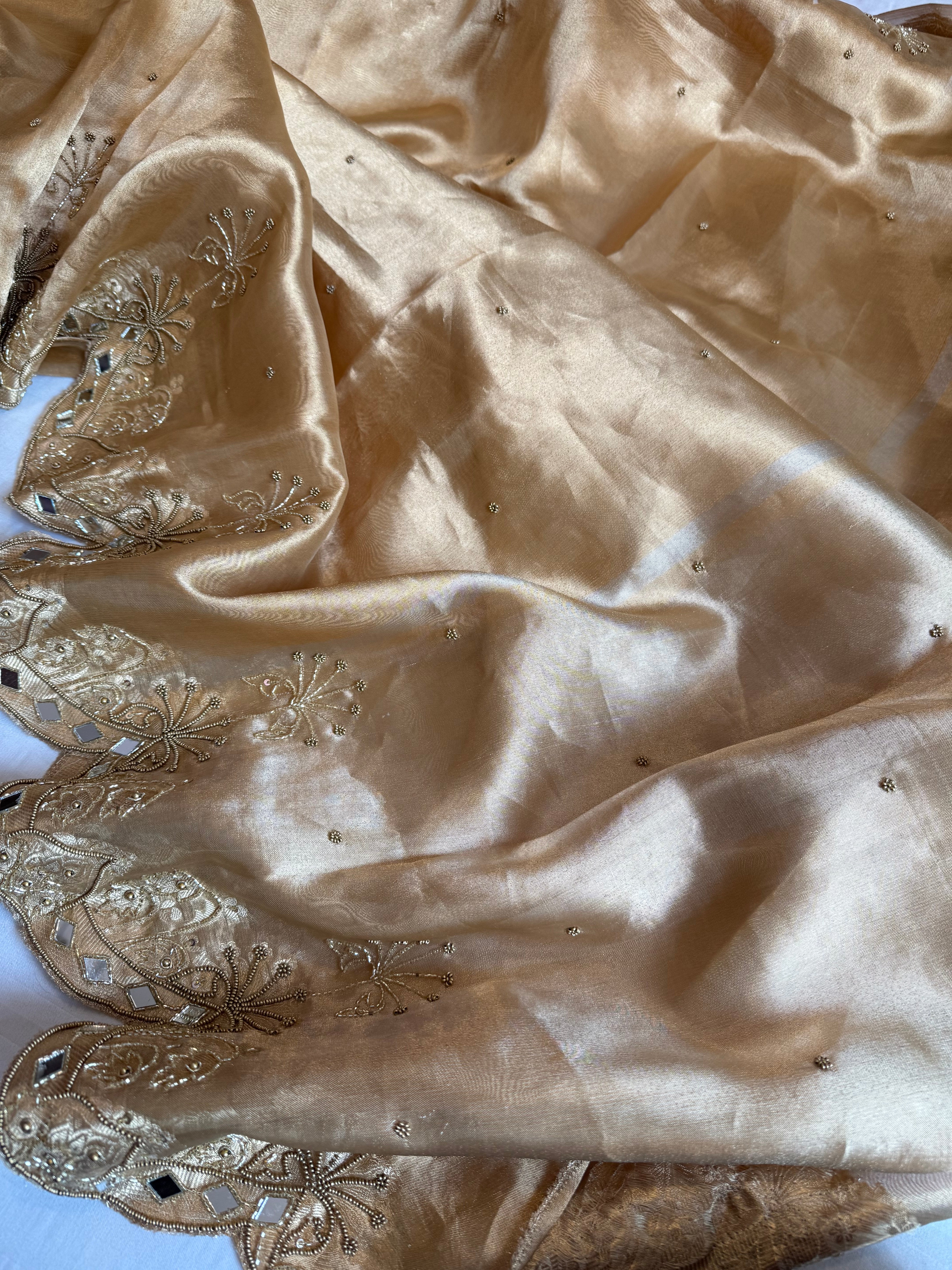 Husn champagne gold tissue silk heavy hand embroidered saree