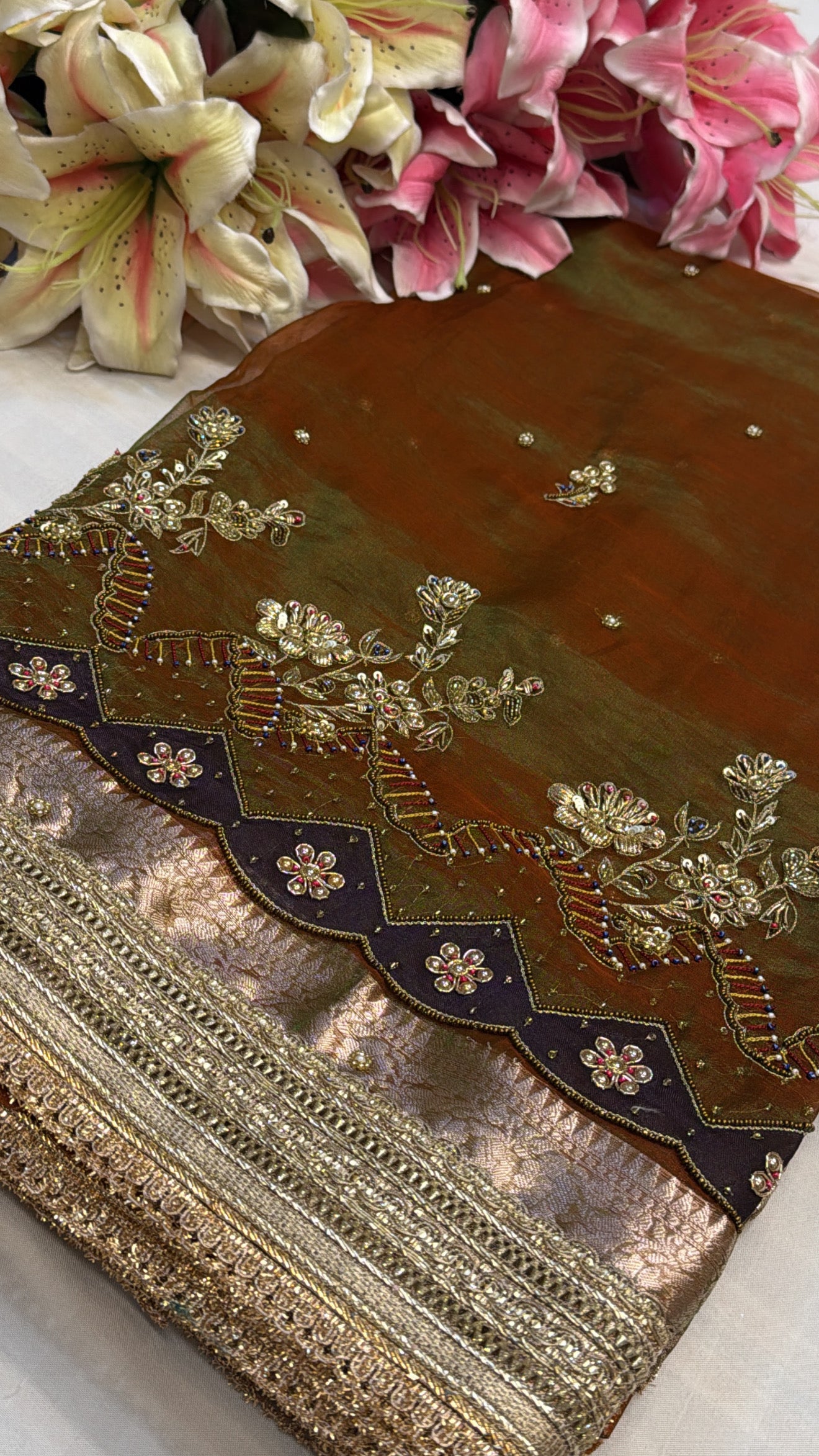 Mehendi green dhup chao effect tissue silk hand embroidered saree