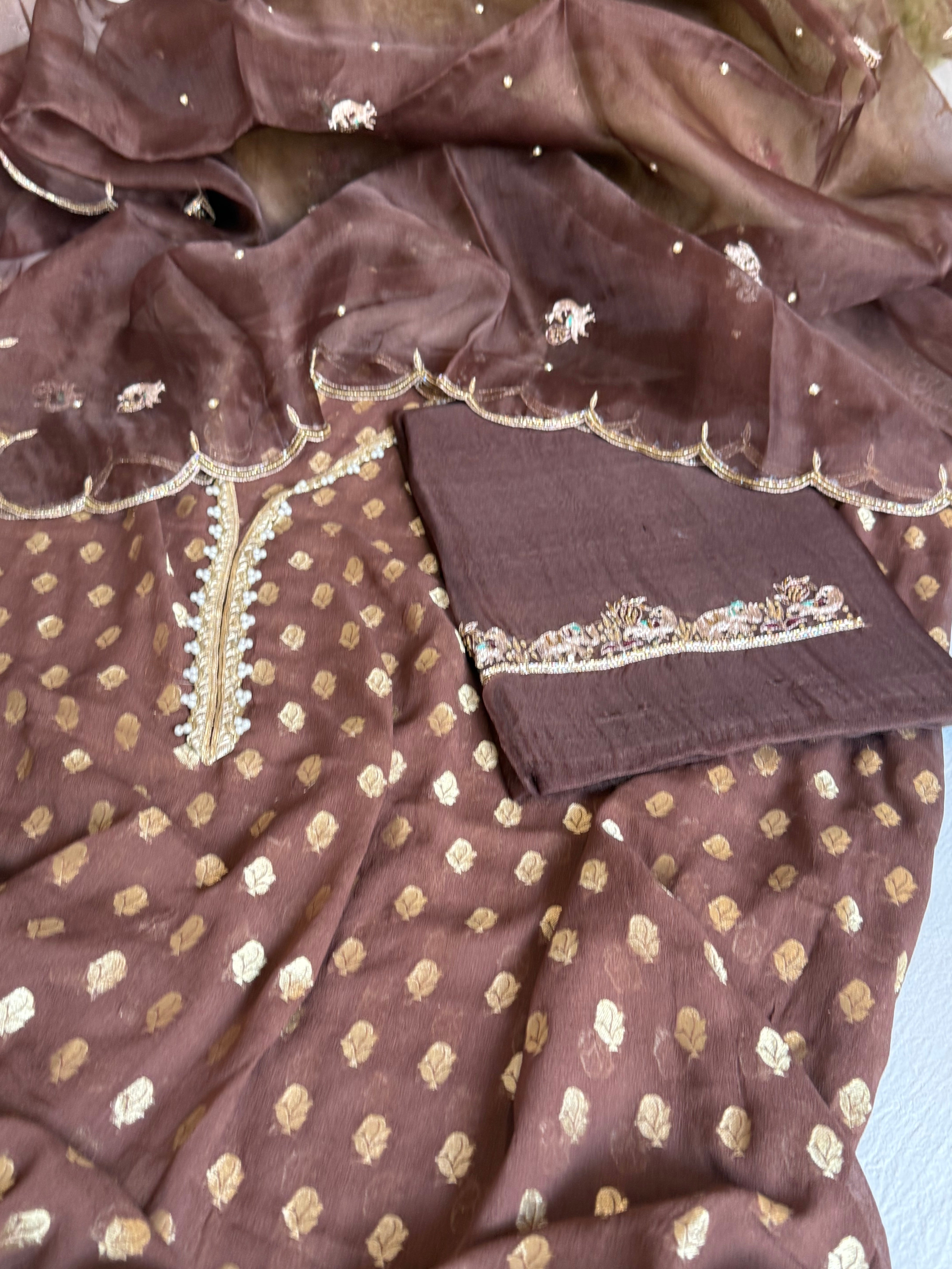 Choco brown banarasi gorgette kadhwa buti kurta paired with toy hathi motif hand embroidered scalloped kora duppata