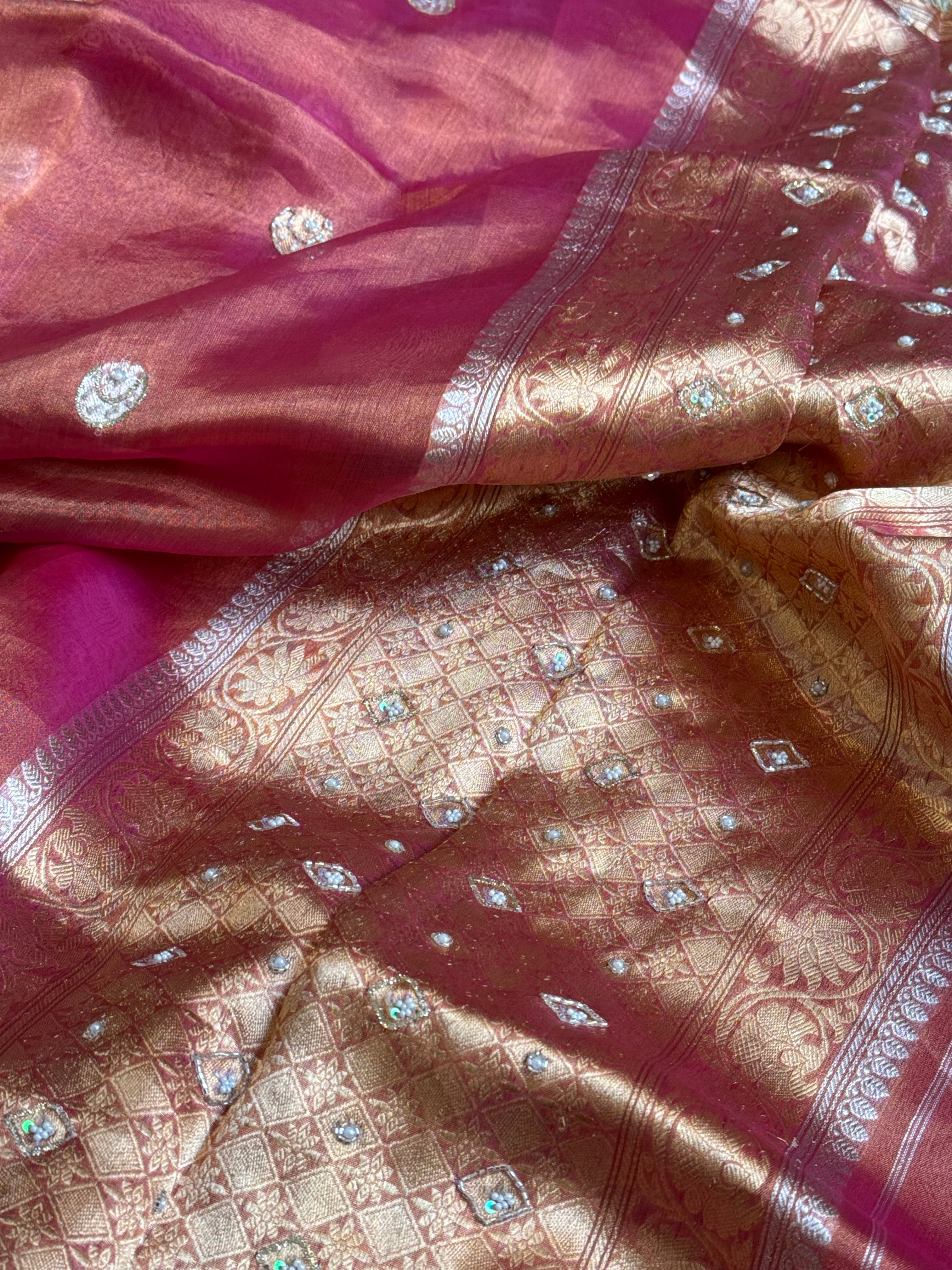 Chand tara rani pink dhup chao effect tissue silk hand embroidered saree
