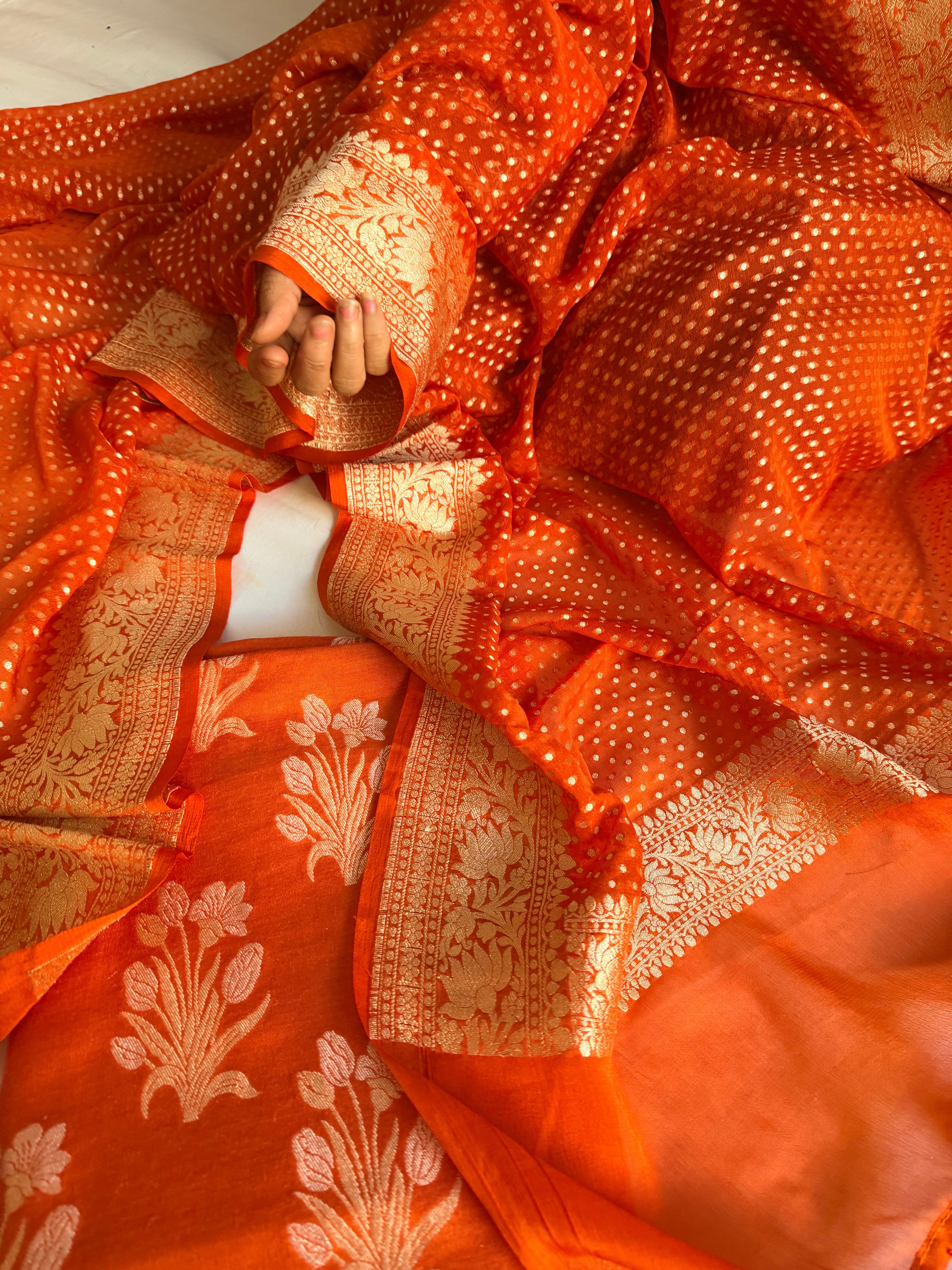 Moonga silk kadhwa kurta paired with gorgette duppata with latkans