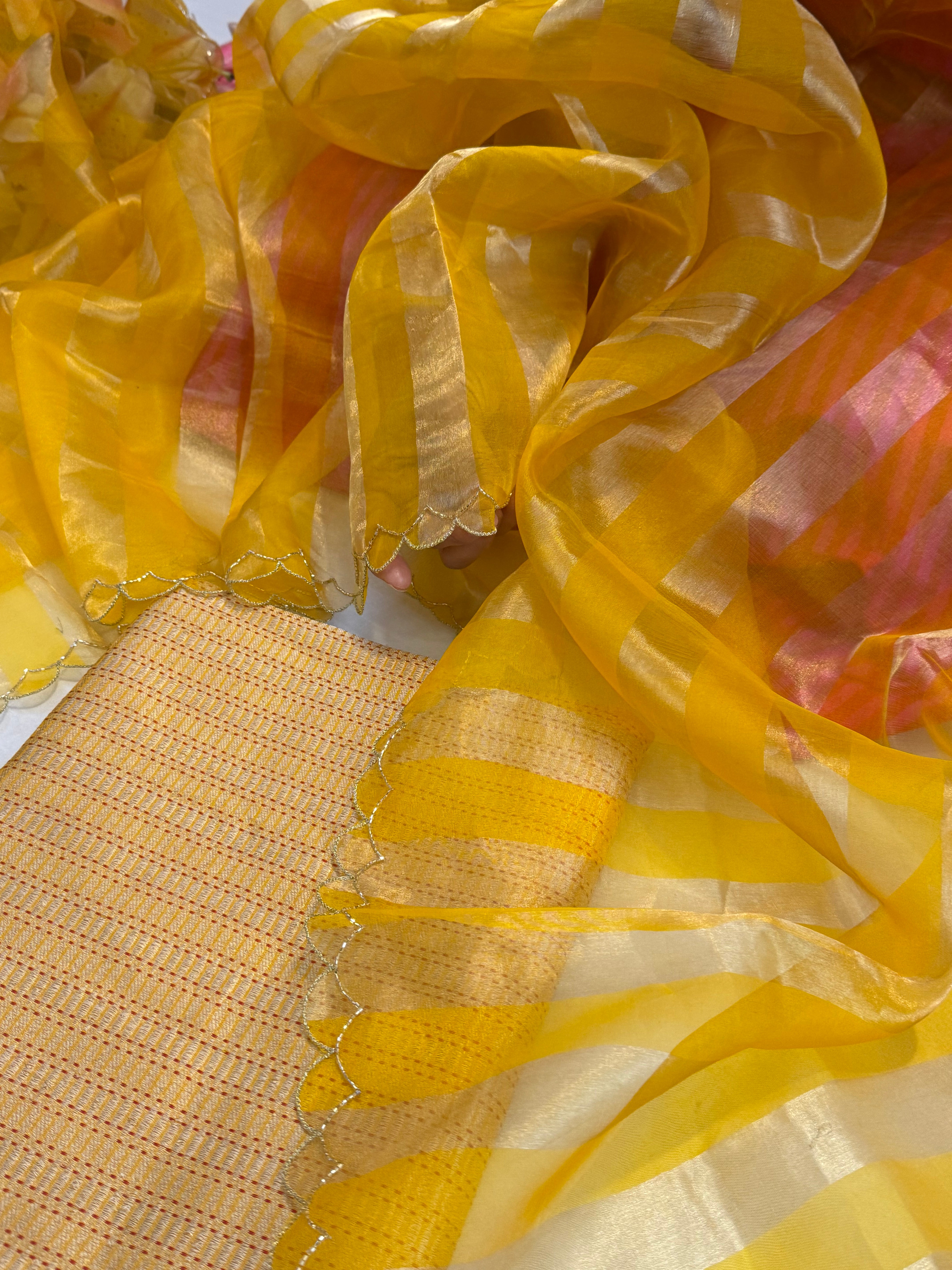 Haldi yellow katan silk brocade kurta paired with kora tissue scalloped striped duppata set