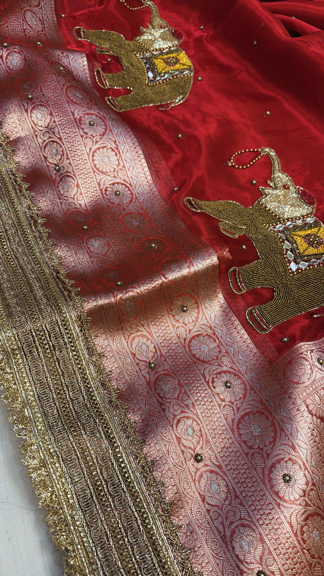 Red special - Husn hot red tissue silk elephant motif hand embroidered saree