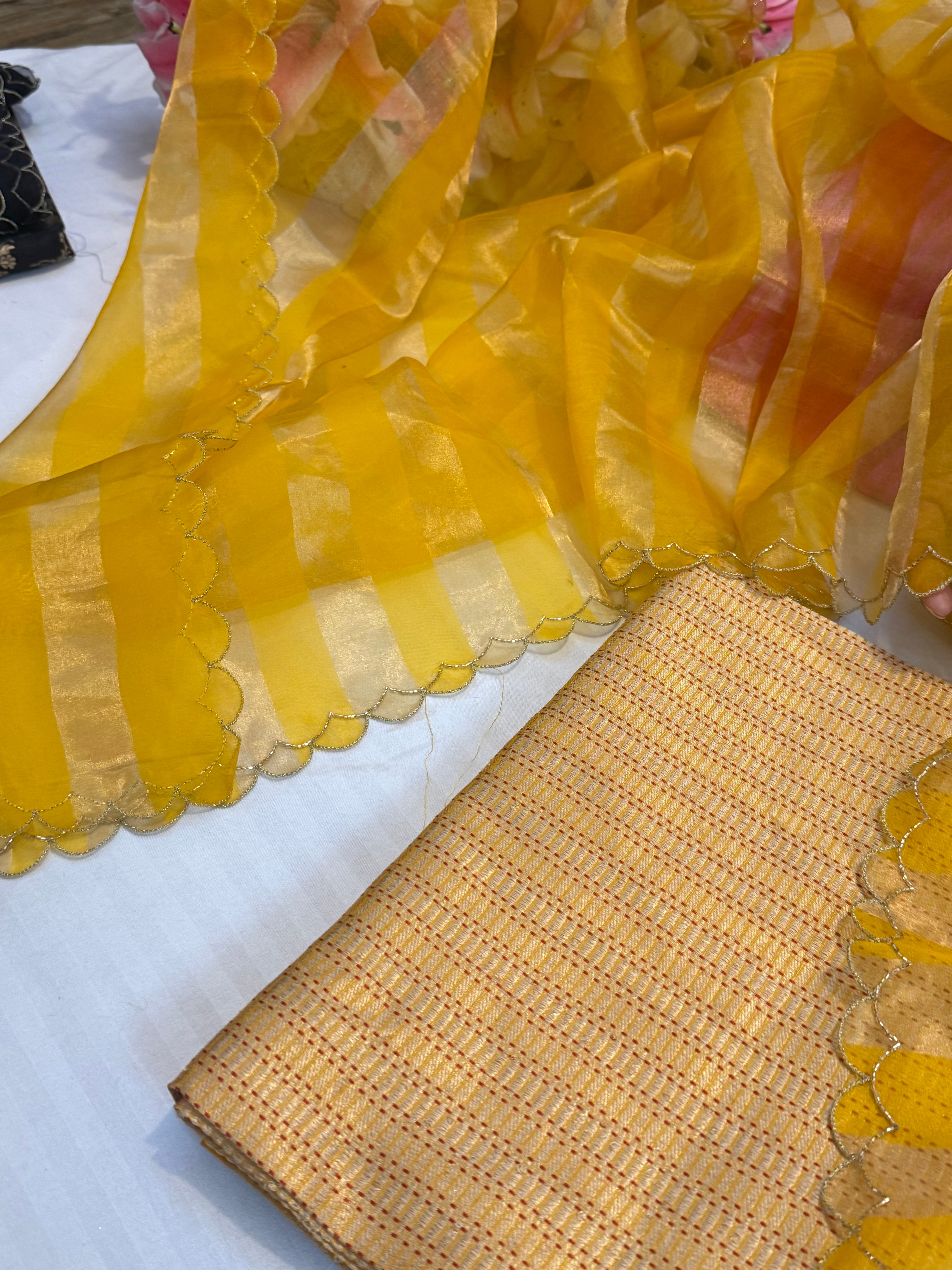 Haldi yellow katan silk brocade kurta paired with kora tissue scalloped striped duppata set