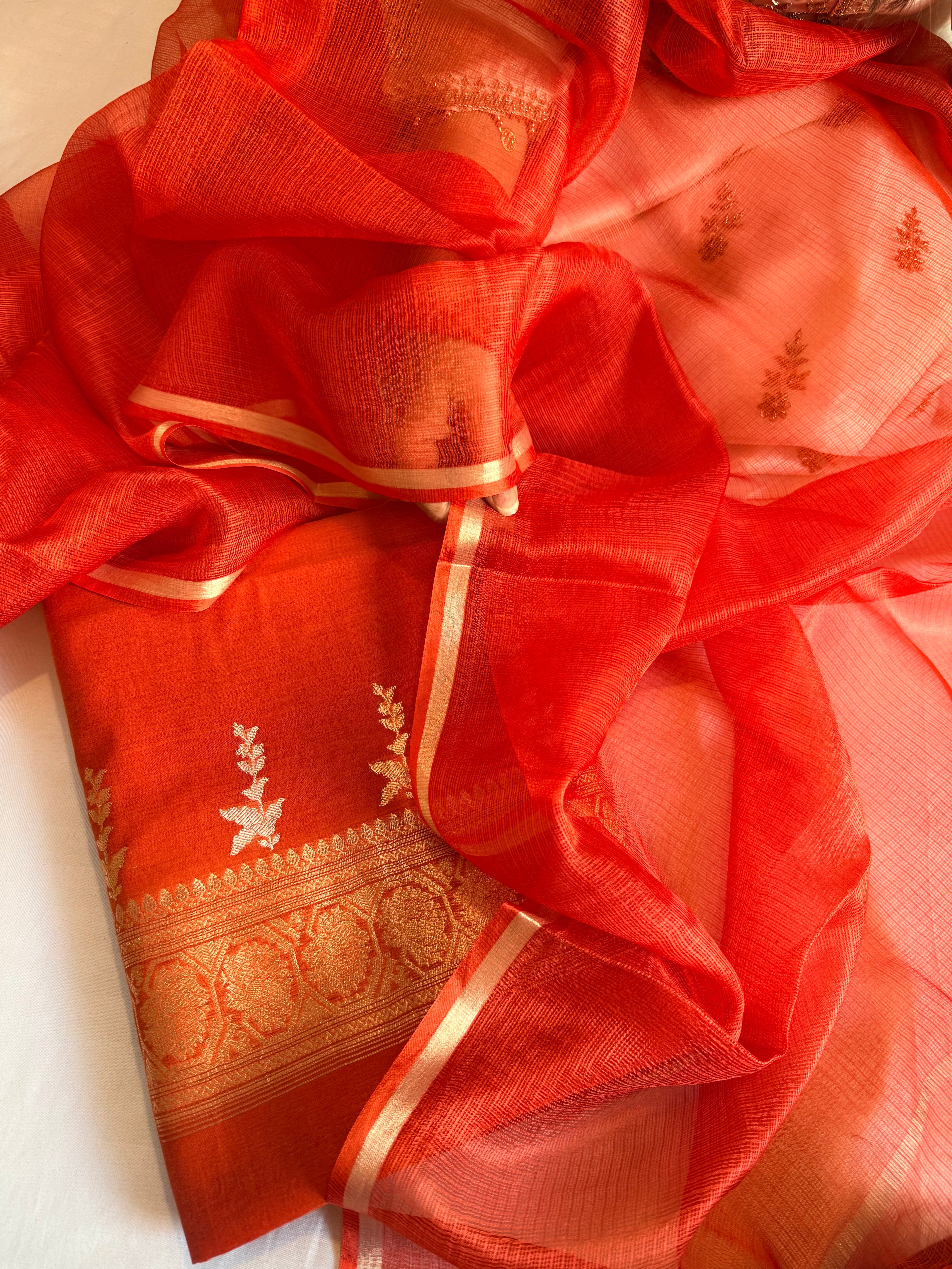 Rust red mul cotton kadhwa buti kurta paired with kora silk net duppata set