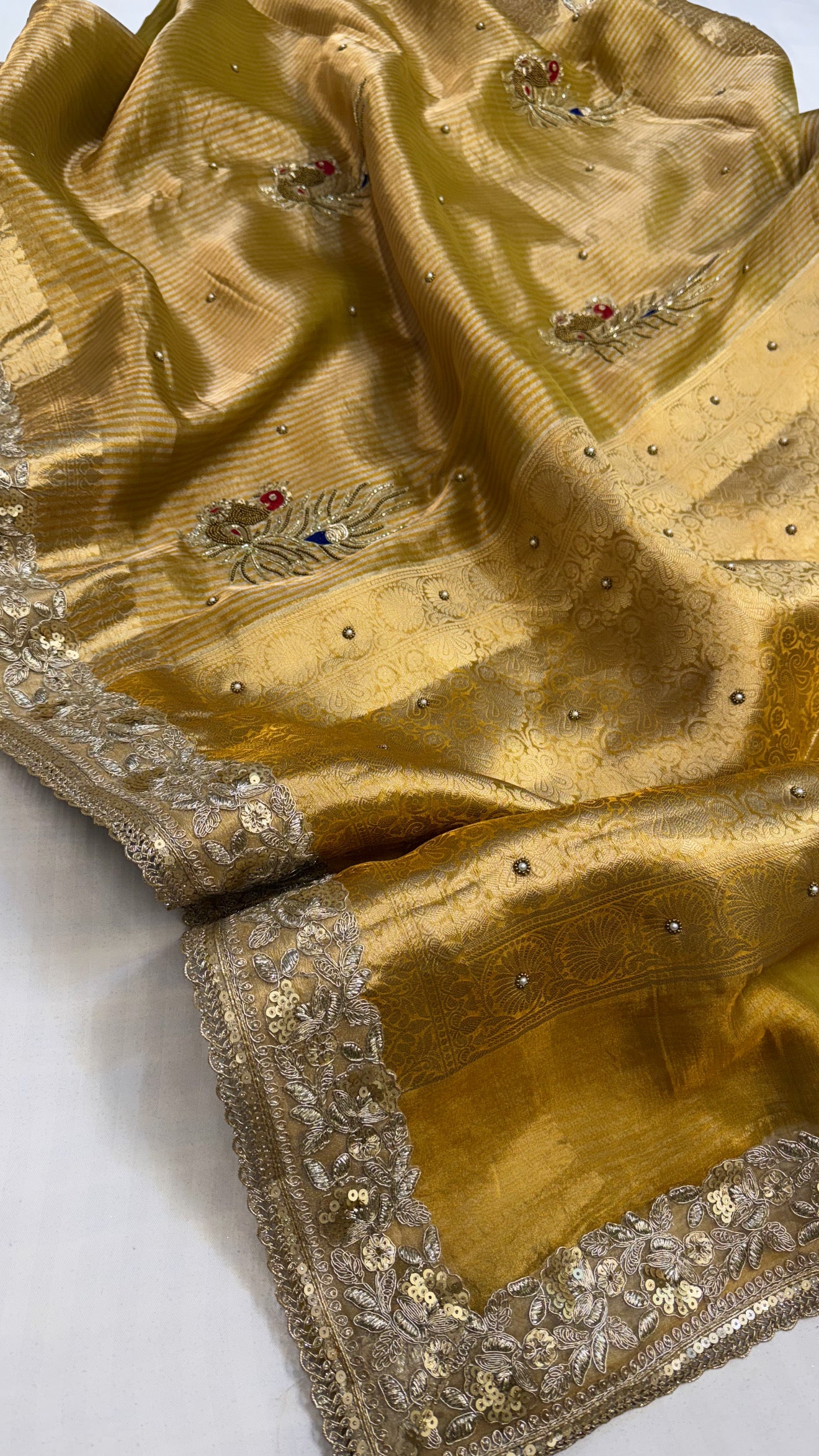 Baarat wali saree - Olive mustard husn tissue silk peacock motif hand embroidered saree