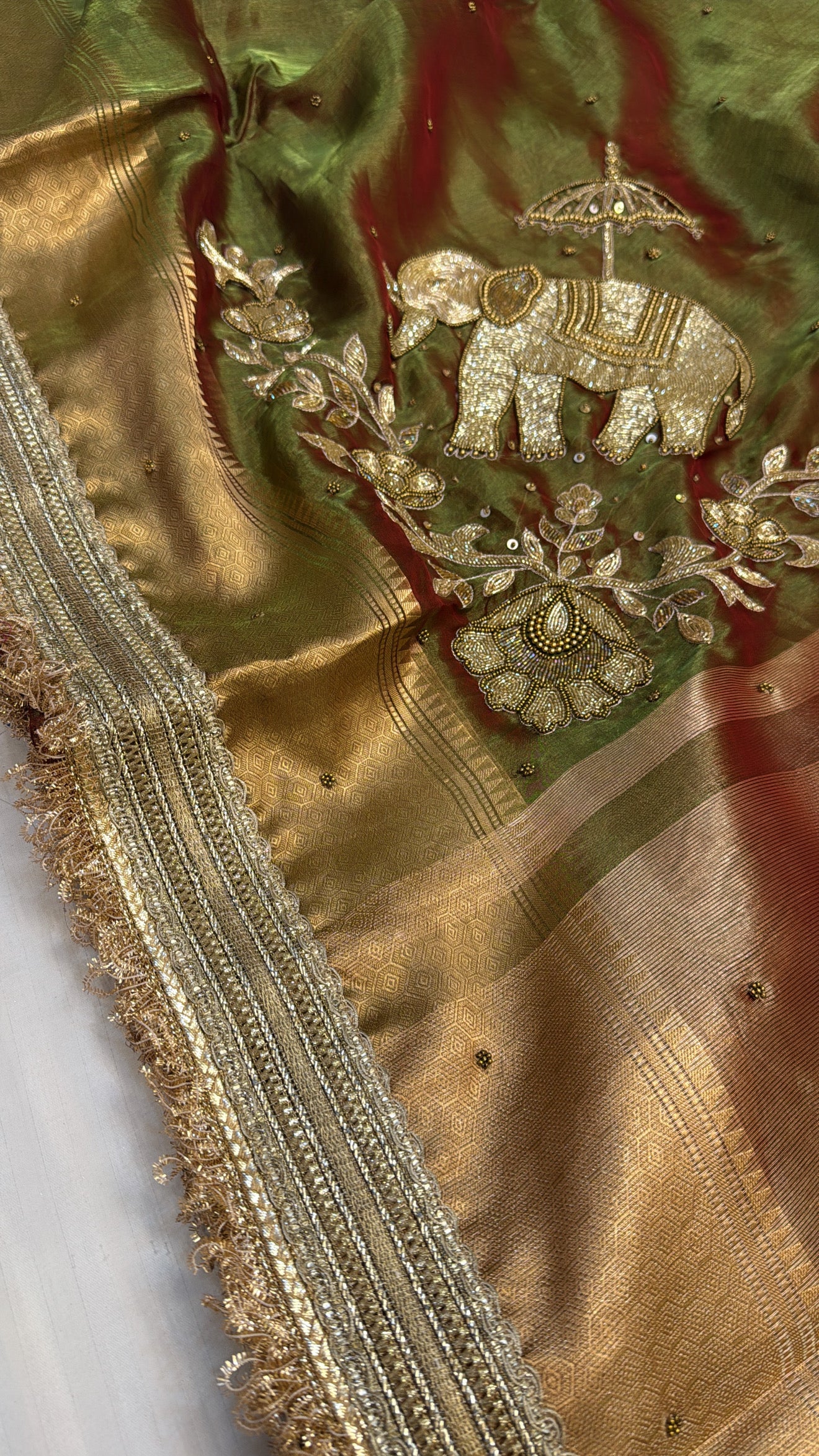 Wedding edit - Husn mehendi green elephant motif tissue silk hand embroidered saree