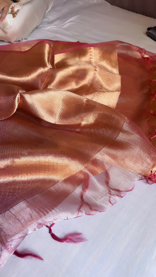 Pinkish-orange dhup-chao effect tissue brocade kadhwa saree