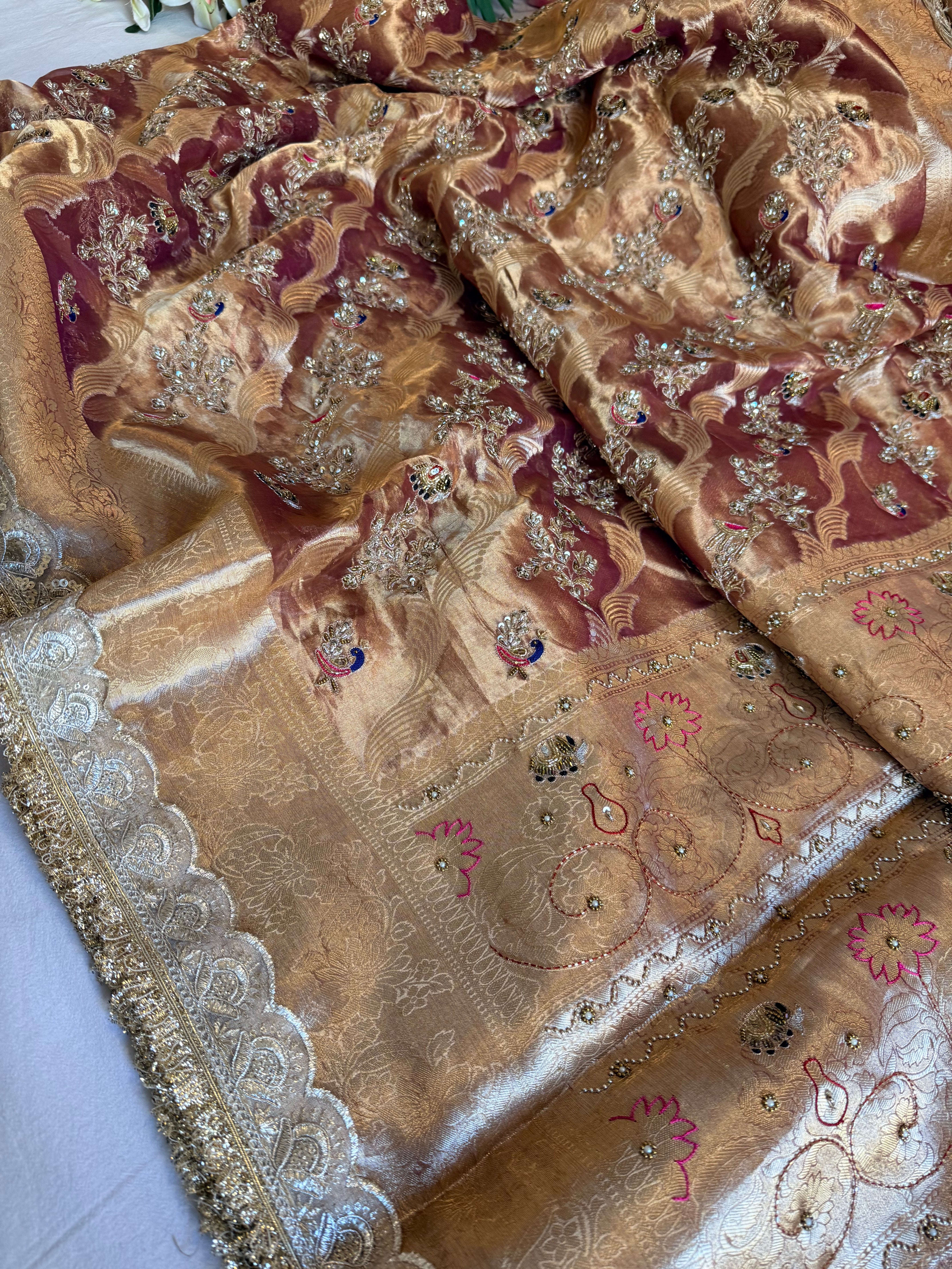 Copperish purple tissue silk hand embroidered shikargah work saree