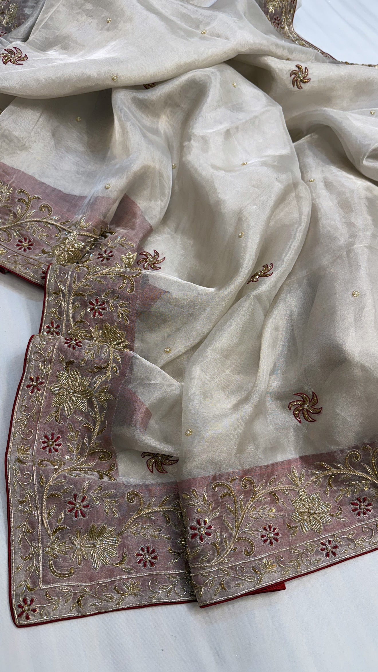 Gulab ki pankhuri husn tissue silk heavy hand embroidered zardozi border saree