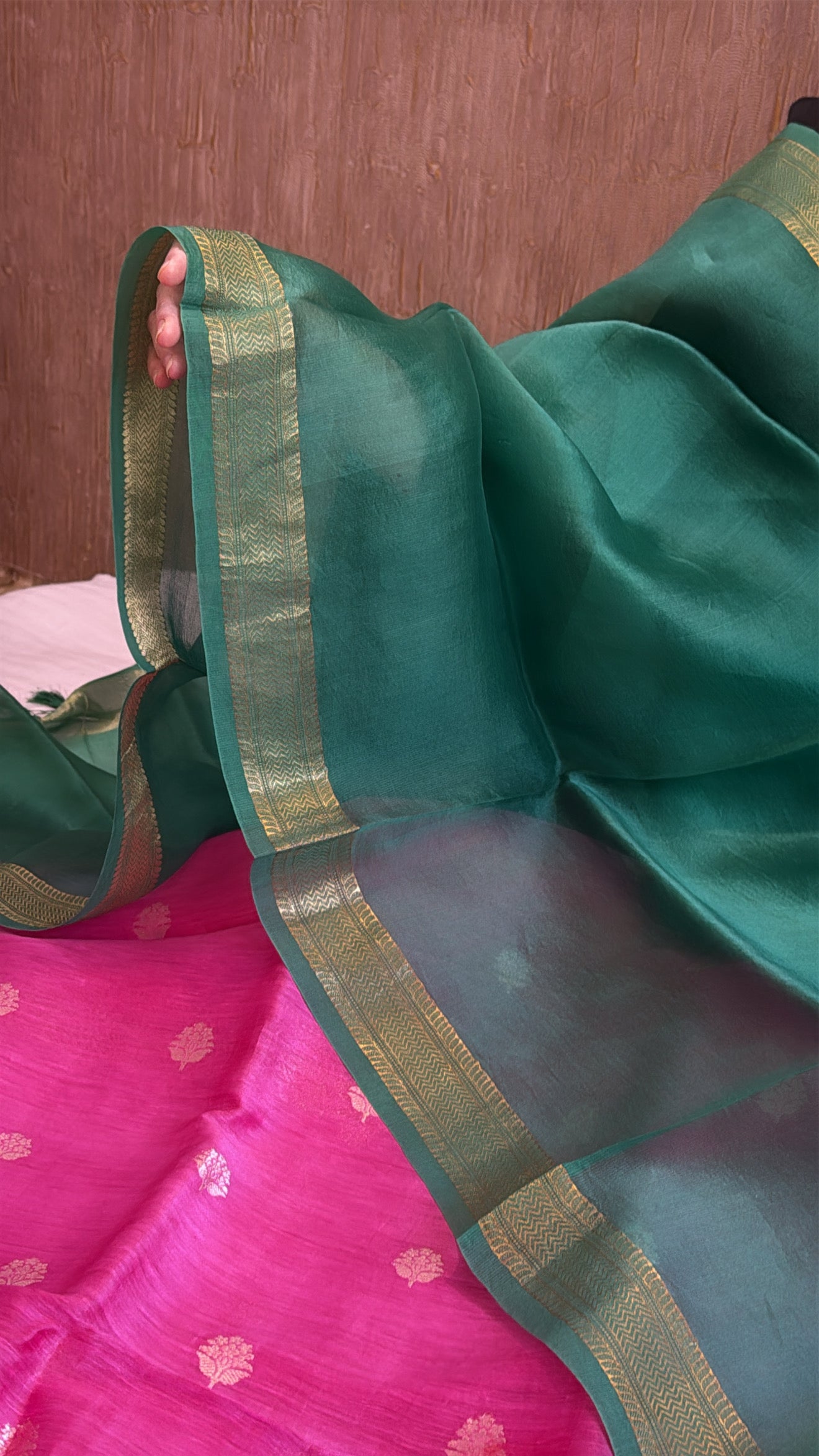 Rani pink linen gorgette kurta paired with green contrast kora silk duppata set
