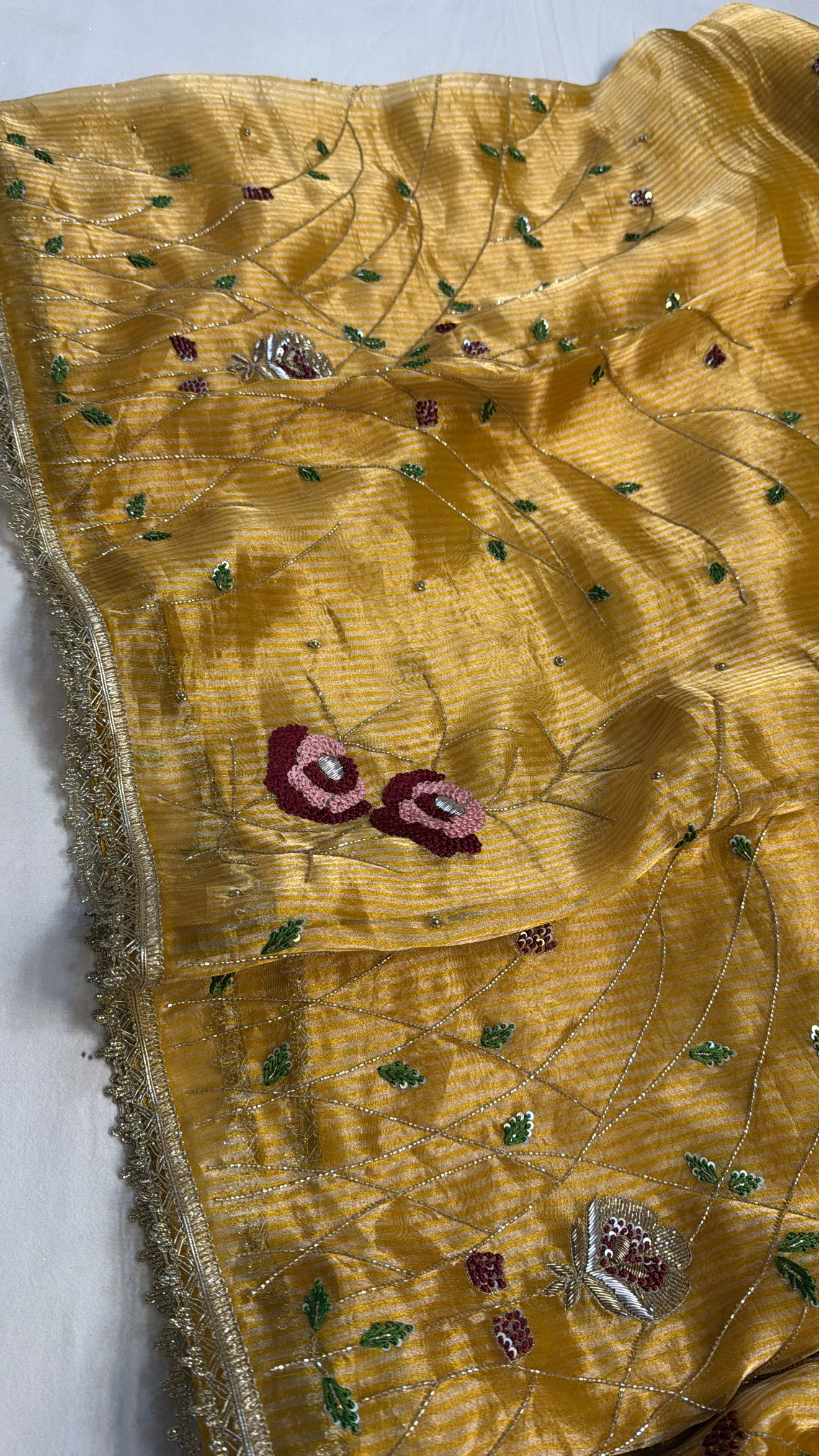 Maharani turmeric yellow tissue silk heavy meenakari hand embroidered saree
