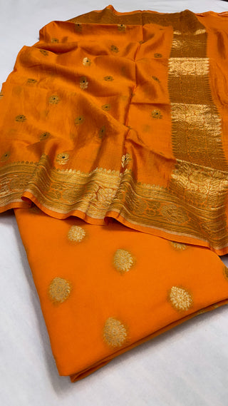 Bright mango gorgette kurta paired with moonga silk kadhwa duppata suit set