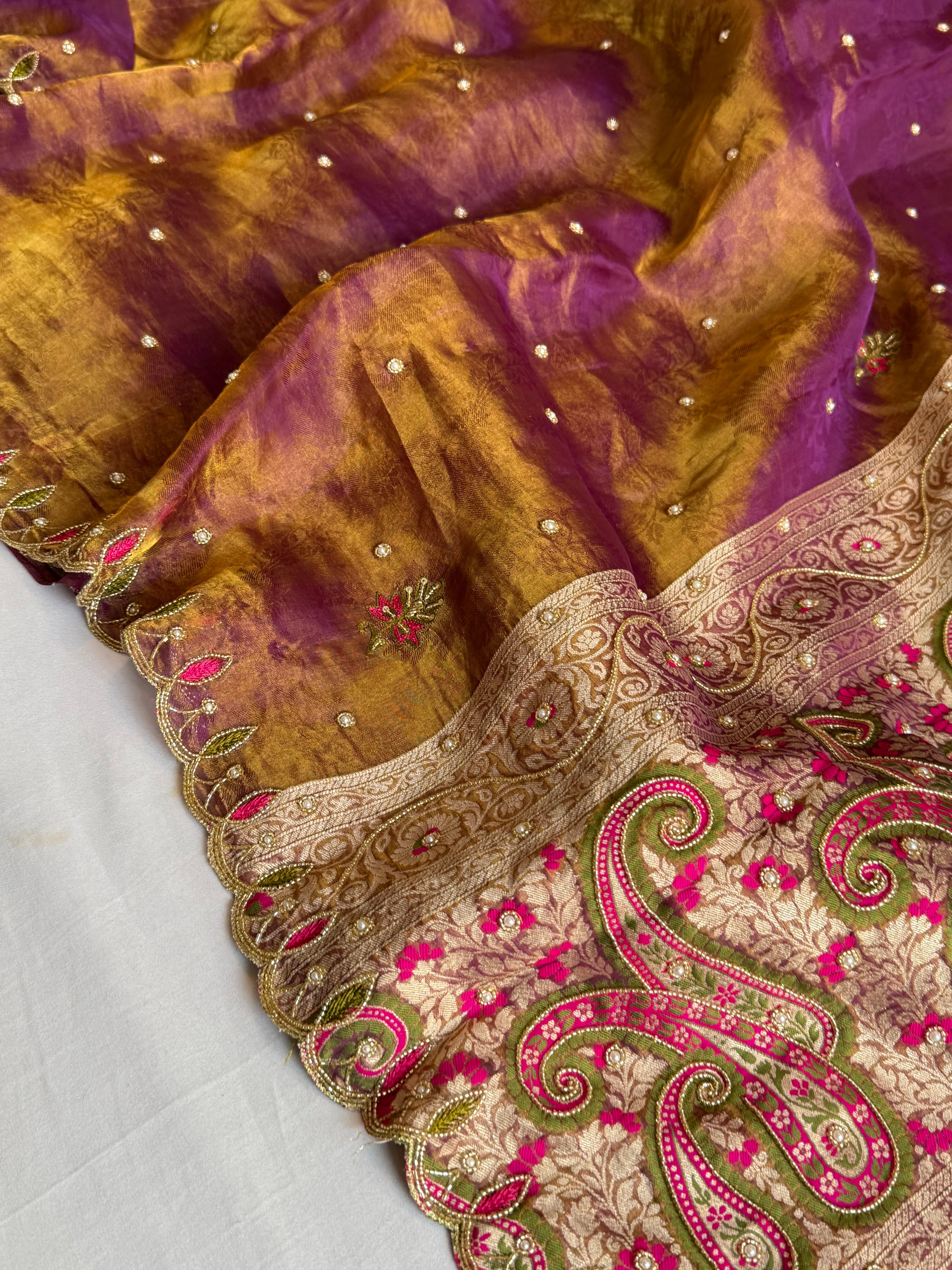 Copperish purple dhup chao effect tissue tanchoi jamevar meenakari pallu hand embroidered saree
