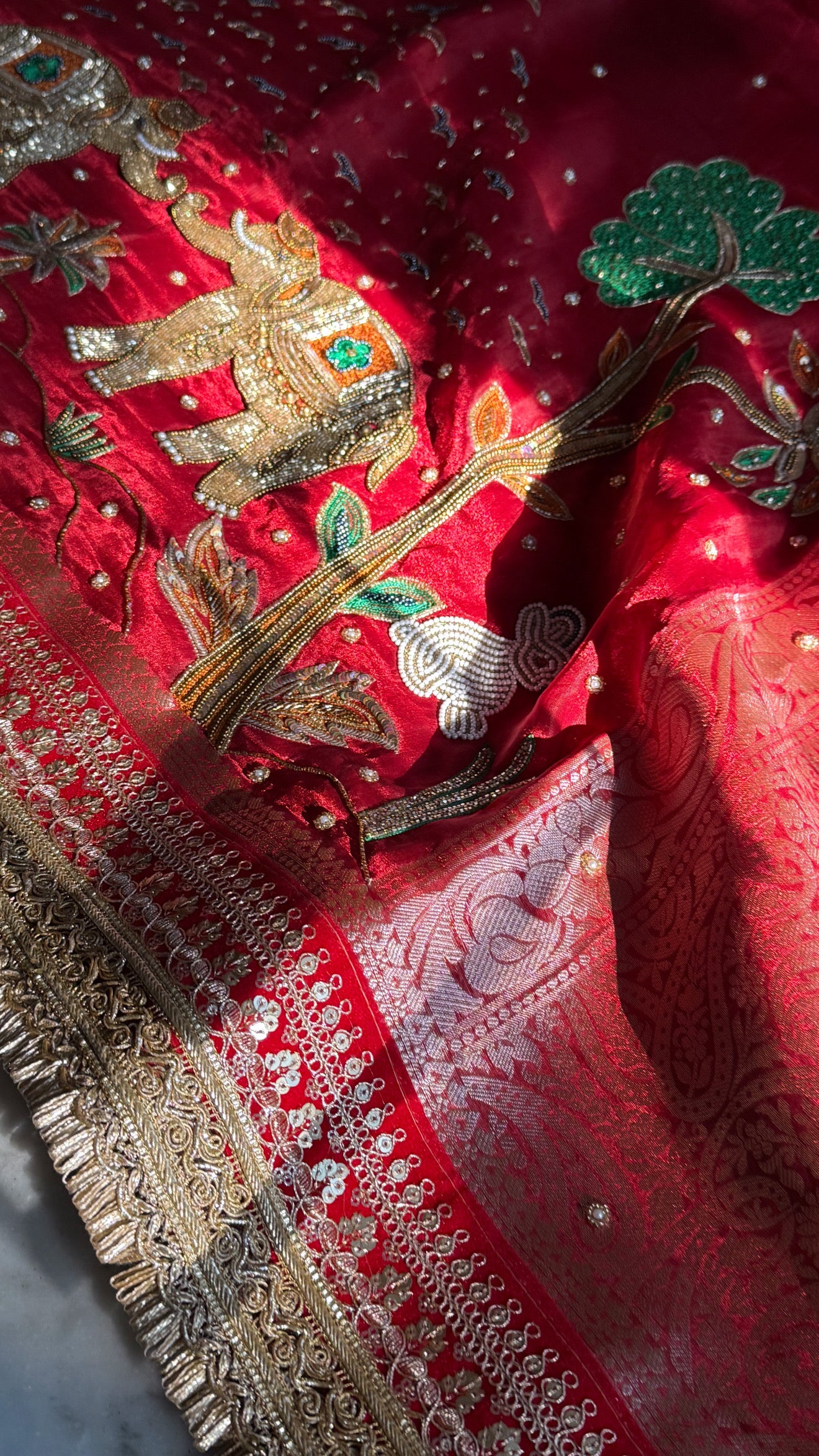 Teej special - Tomato blood red tissue silk elephant motif hand embroidered kadhwa saree