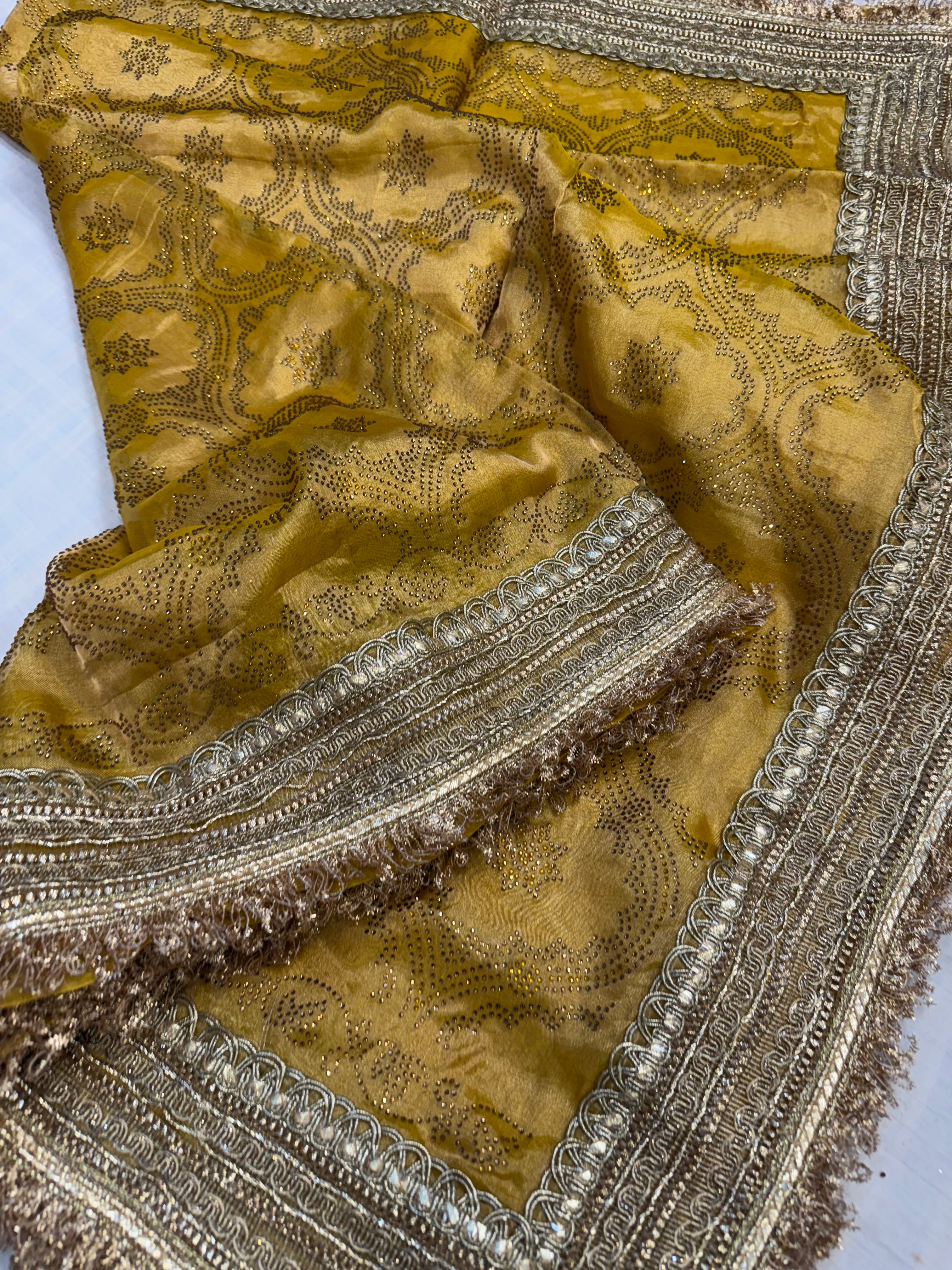 Sitara stonework haldi yellow tissue silk gotapatti saree