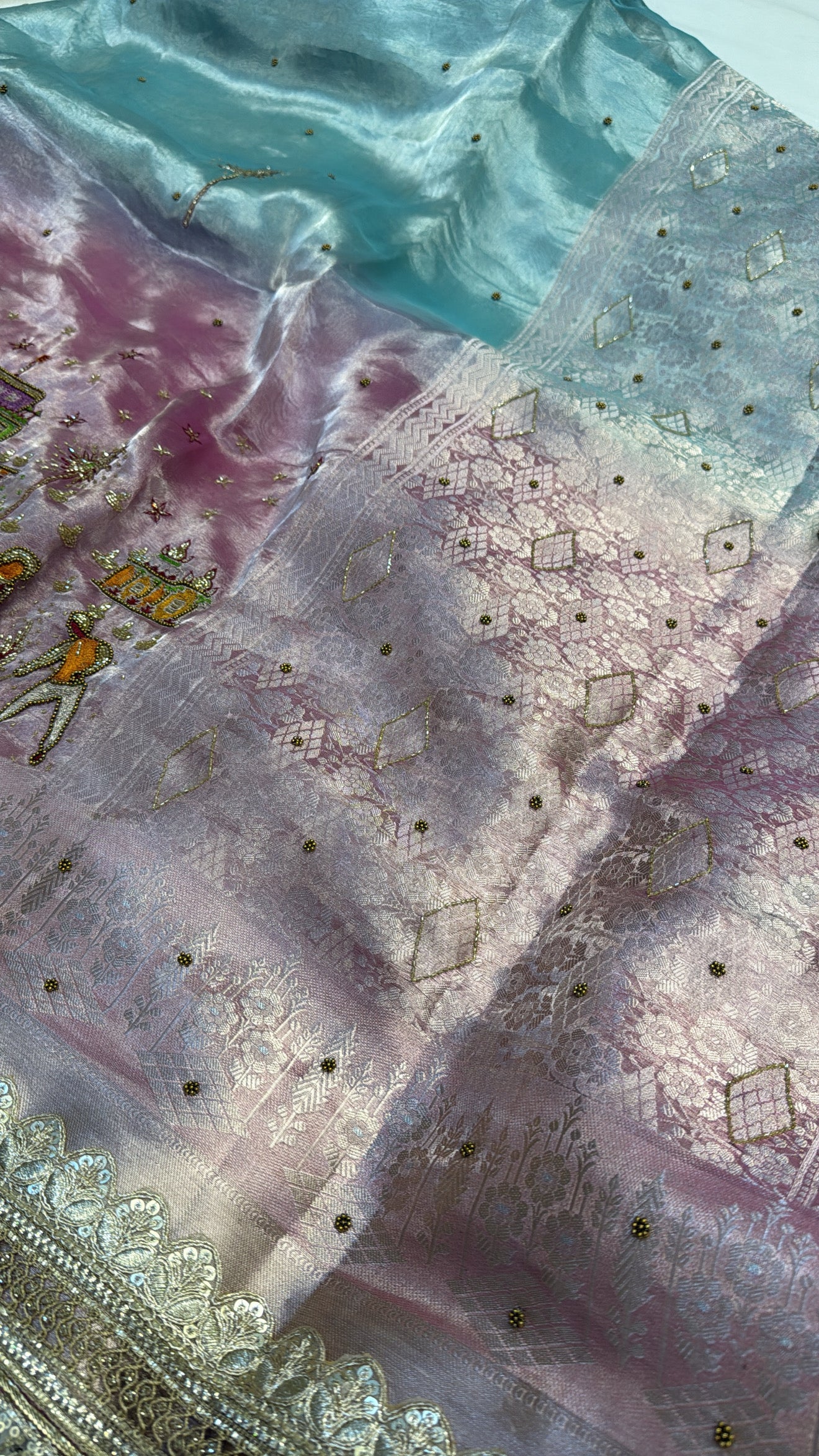 Blush pink-blue ombre shaded tissue silk hand embroidered saree