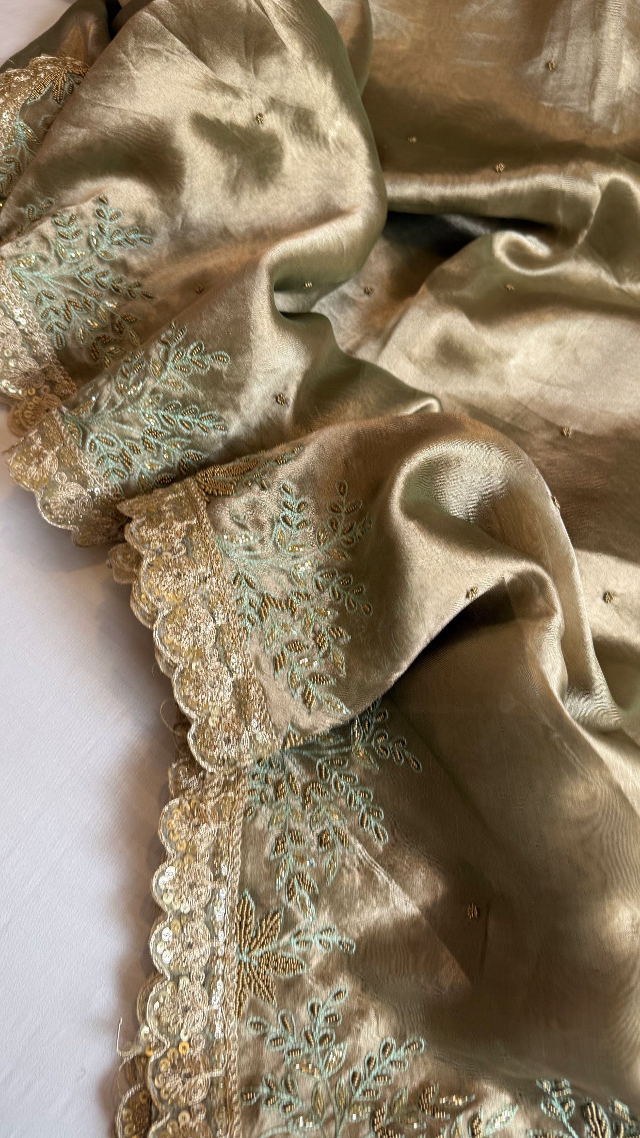 Husn tissue silk sage green heavy zardozi hand embroidered saree