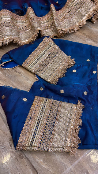 Mastani peacock blue tissue silk kadhwa buti dhup chao effect lehenga set