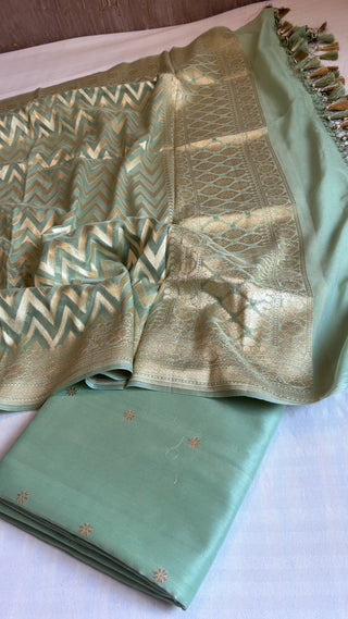 Mint green chiniya silk kurta paired with gorgette duppata and bottom set