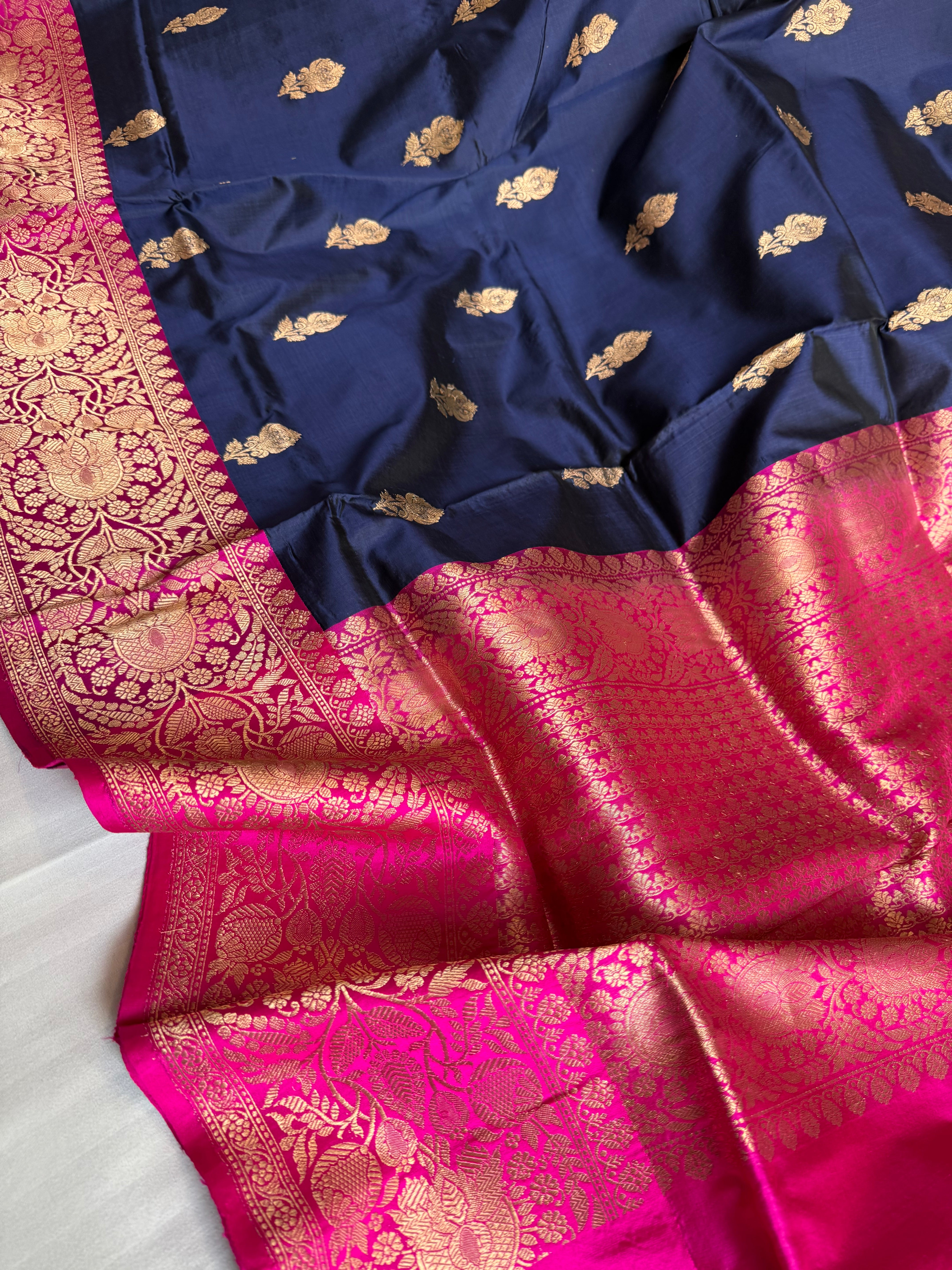 Navy blue-rani pink contrast combination katan silk kadhwa saree