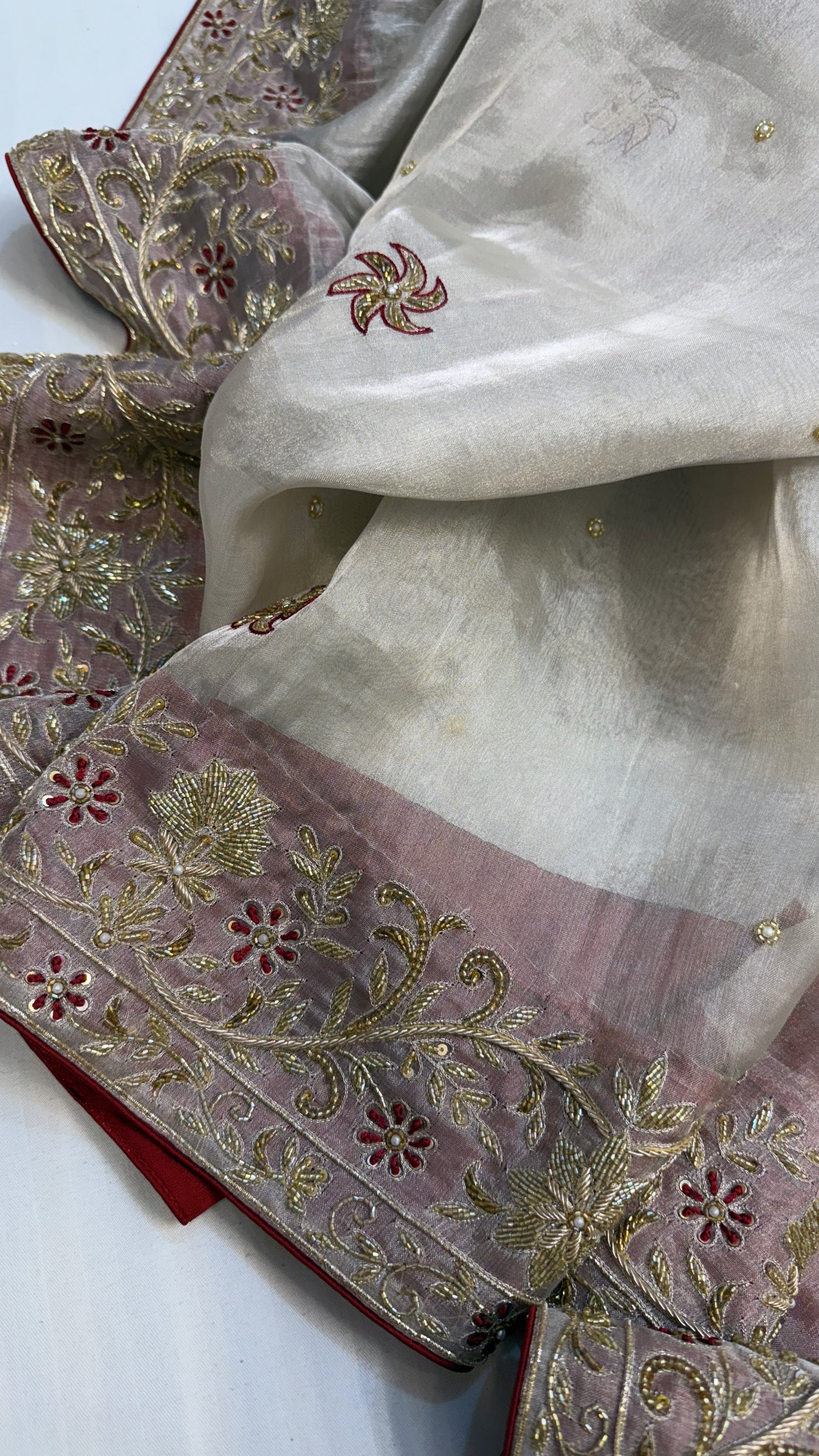 Gulab ki pankhuri husn tissue silk heavy hand embroidered zardozi border saree