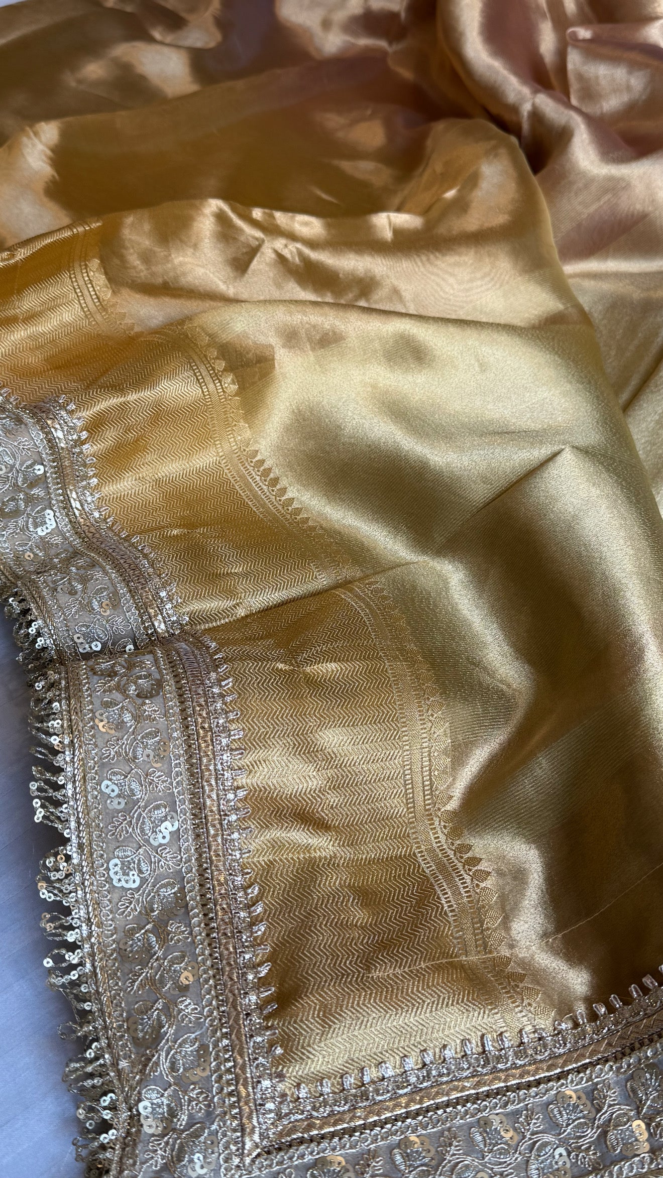 Earthy shades of rang birangi maharani tissue silk kadhwa saree
