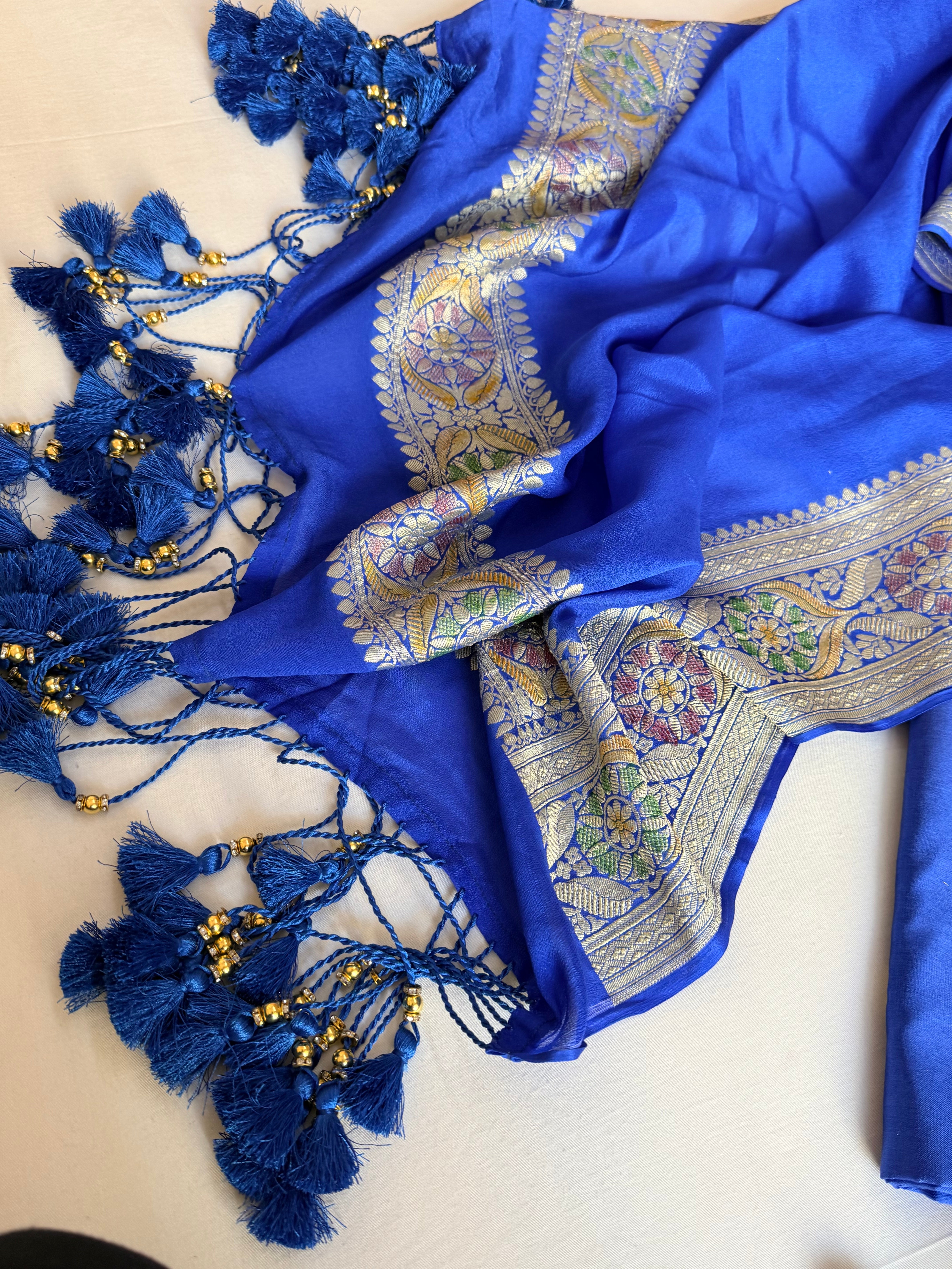 Moonga silk kadhwa kurta paired with gorgette duppata with latkans