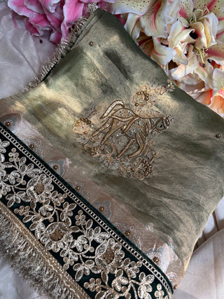 सुनहरा घोड़ा-  Royal horse motif tissue silk mint green hand embroidered saree