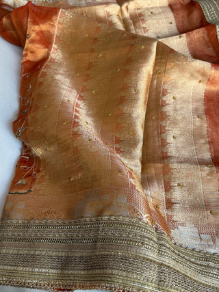 Mughal motif inspired- Fanta orange dhup chao effect husn tissue silk hand embroidered kadhwa saree