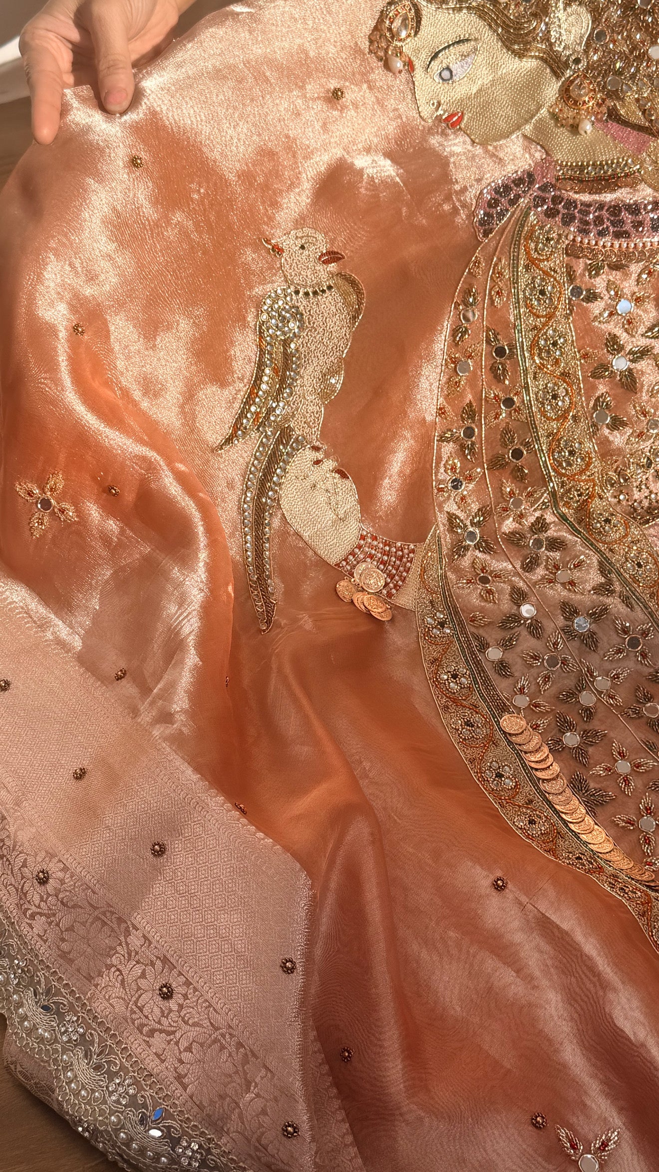 Heer saree with jadau necklace work hand embroidered tissue silk gajri peach saree
