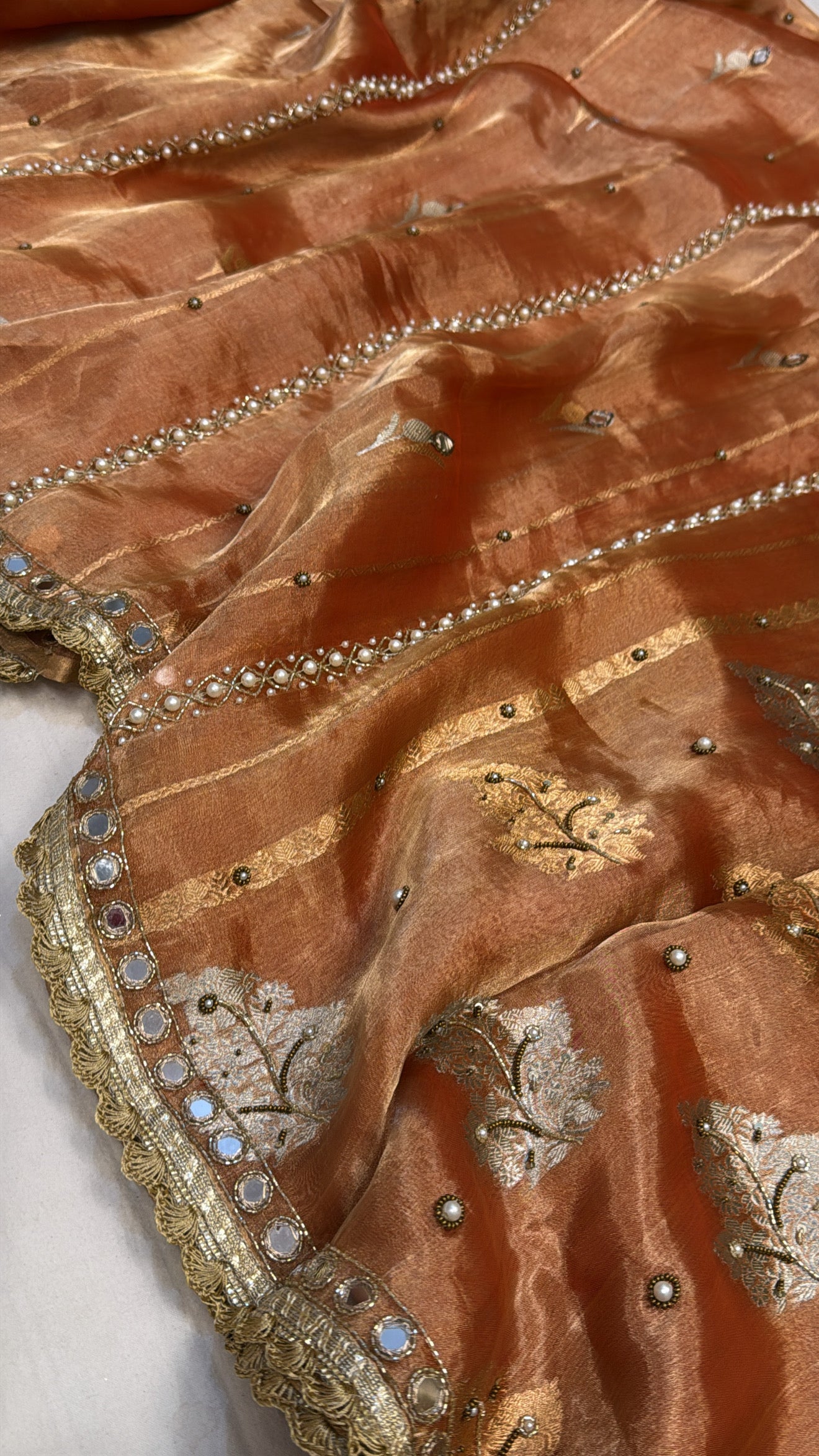 Burnt orange husn tissue silk hand embroidered kadhwa saree