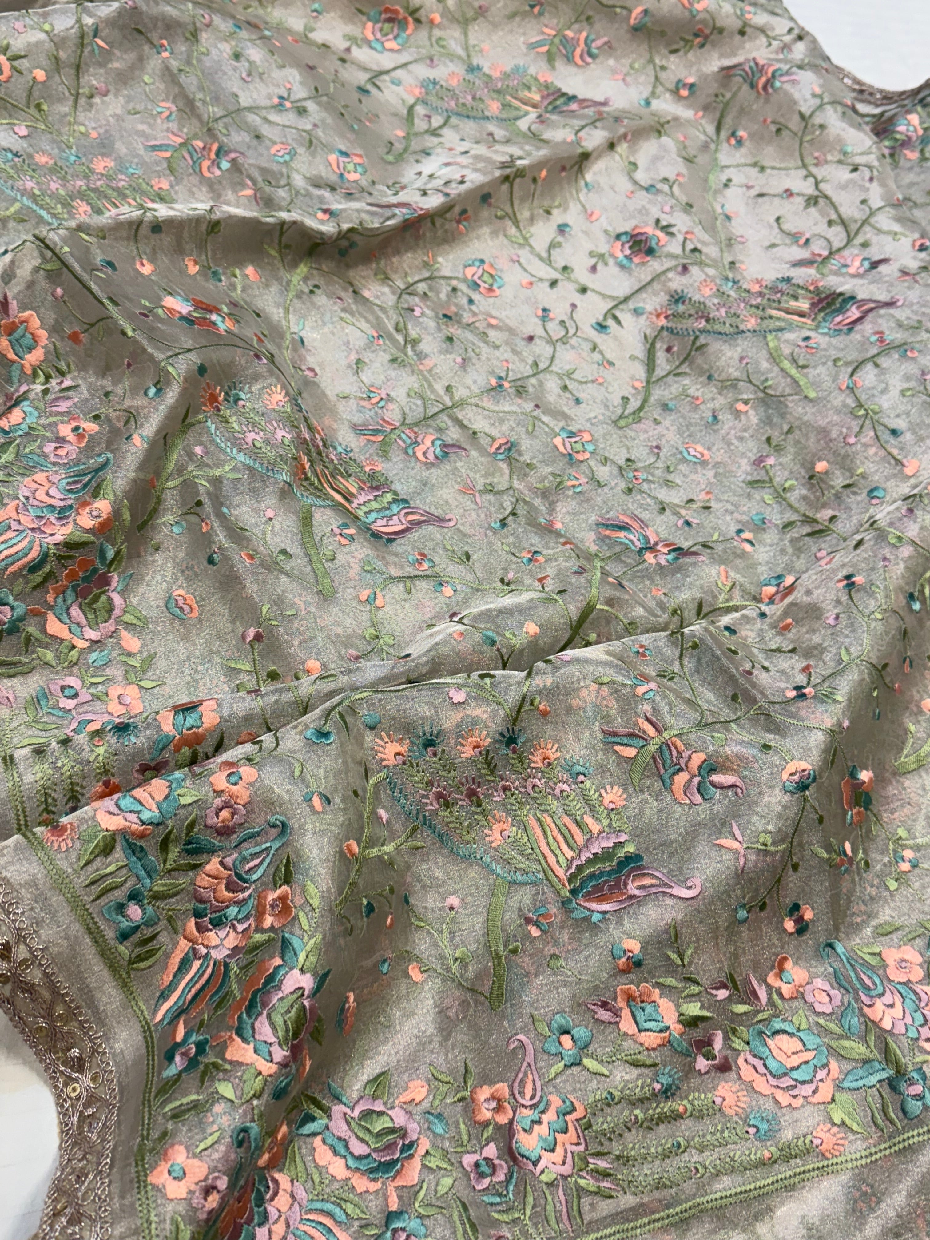 “Parsi gara” inspired tissue silk heavy resham work hand embroidered saree