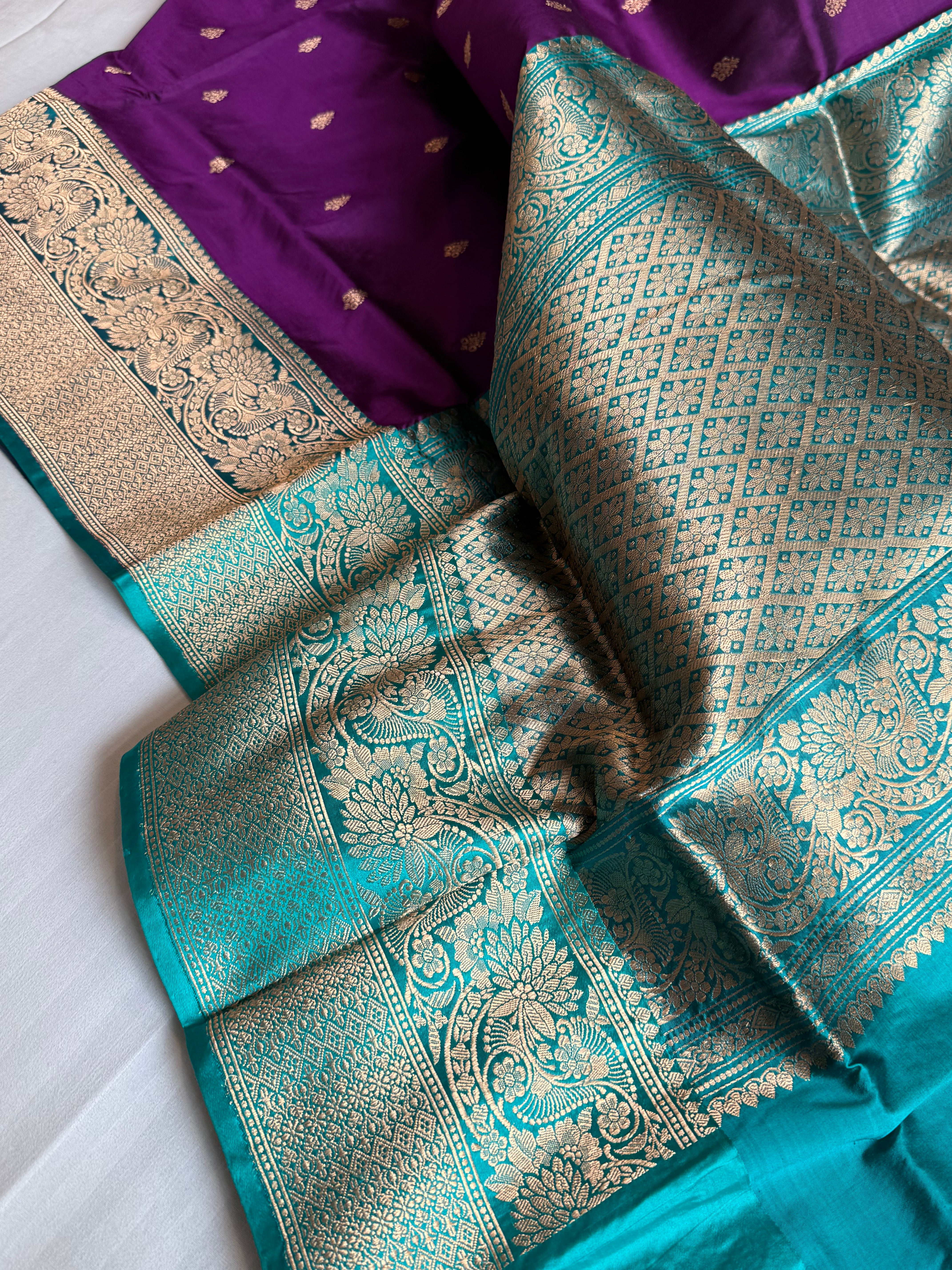 brinjal purple-firozi contrast combination blue katan silk kadhwa saree