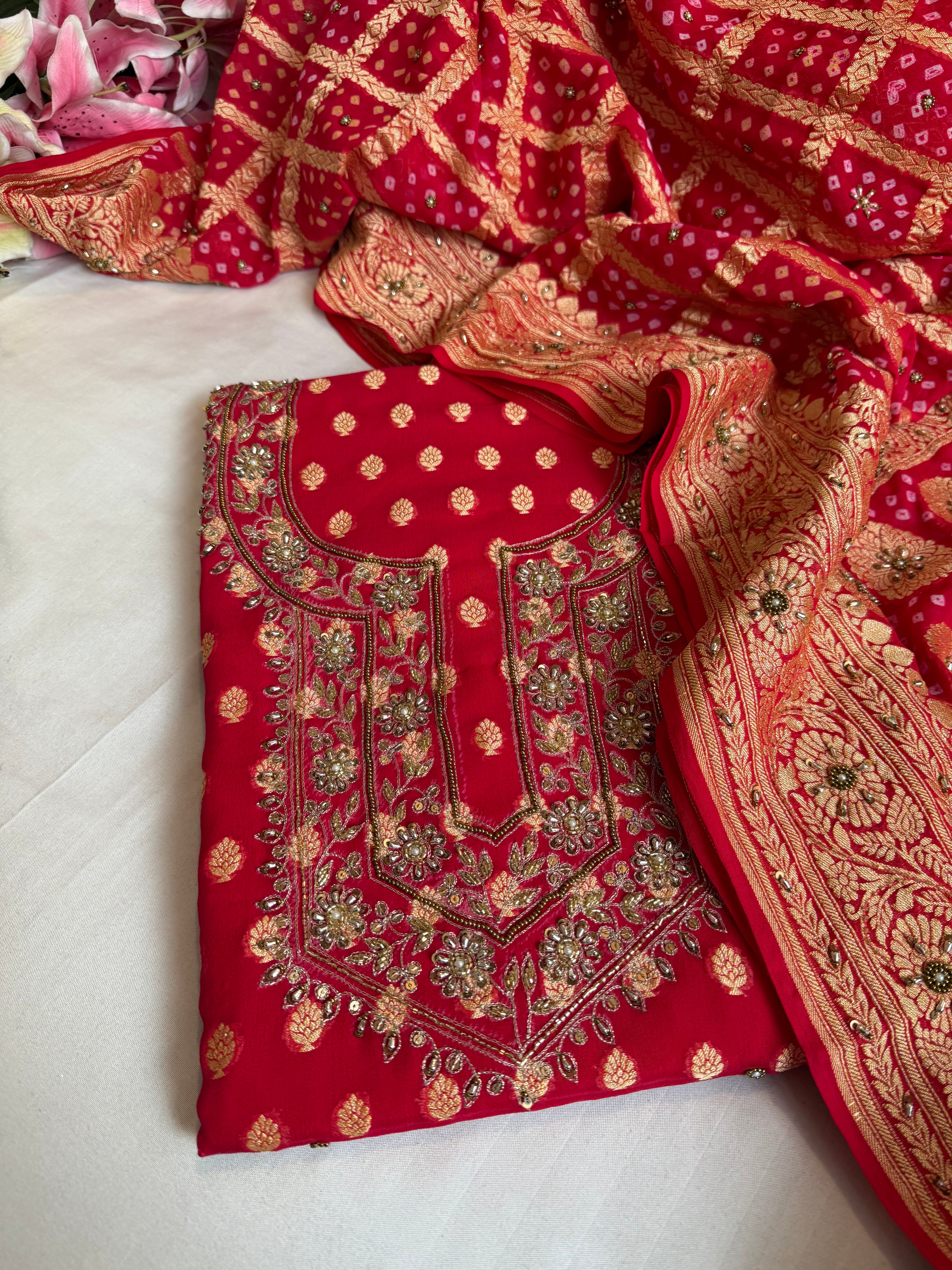 Red rai bandhej kadhwa gorgette hand embroidered suit set