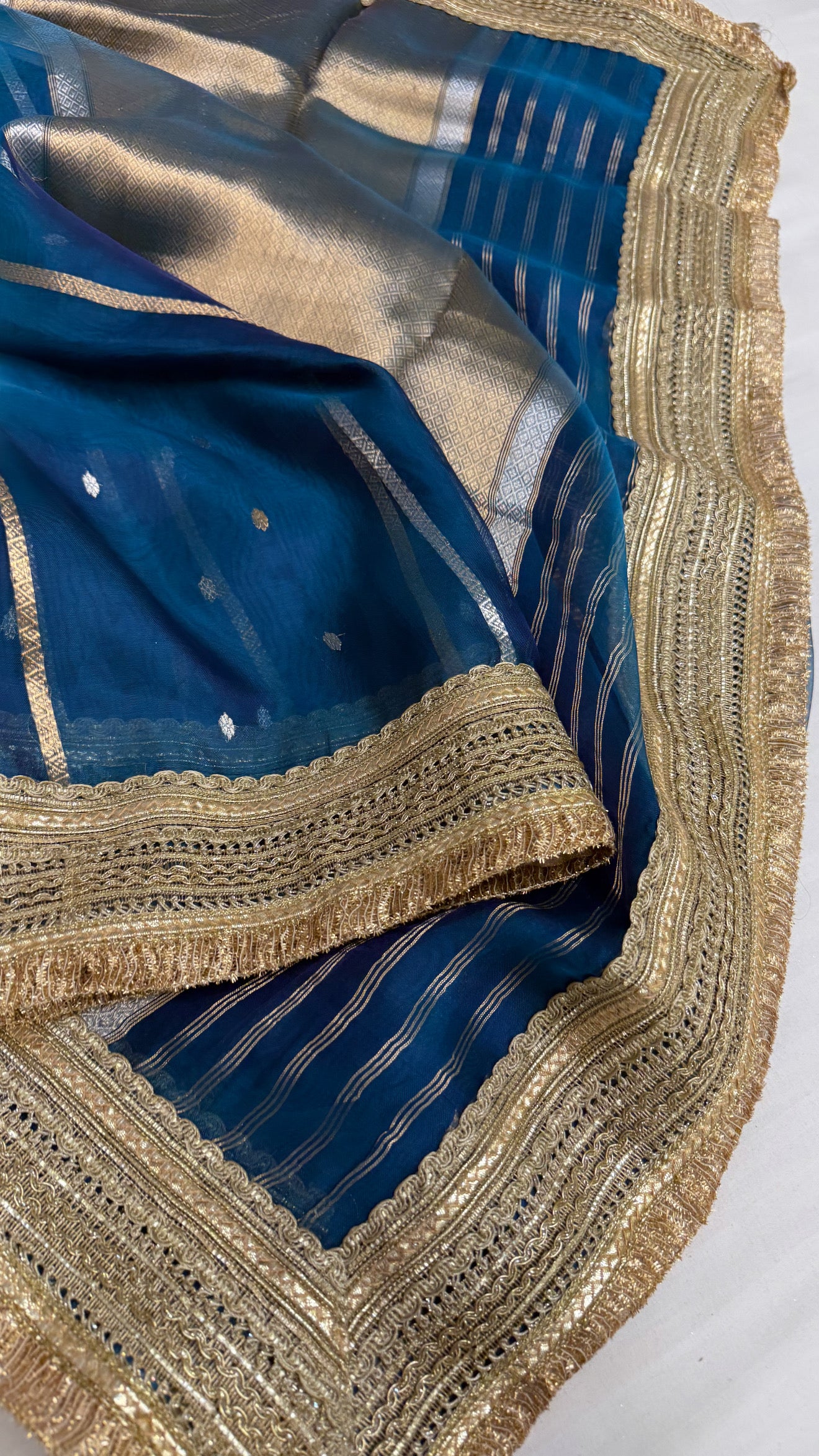 Maharani aqua blue tissue silk kadhwa buti saree